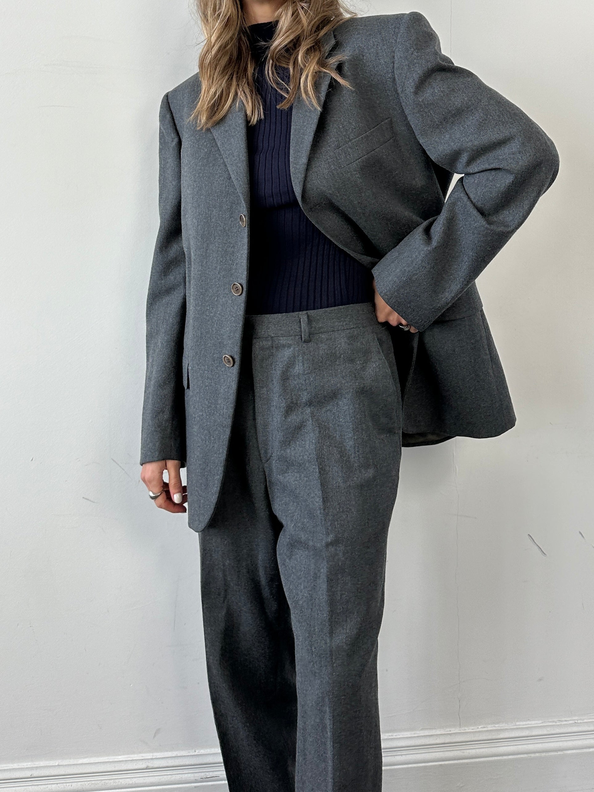 Missoni pure wool single-breasted jumpsuit in size 42R/W32, featuring tailored fit and classic design.
