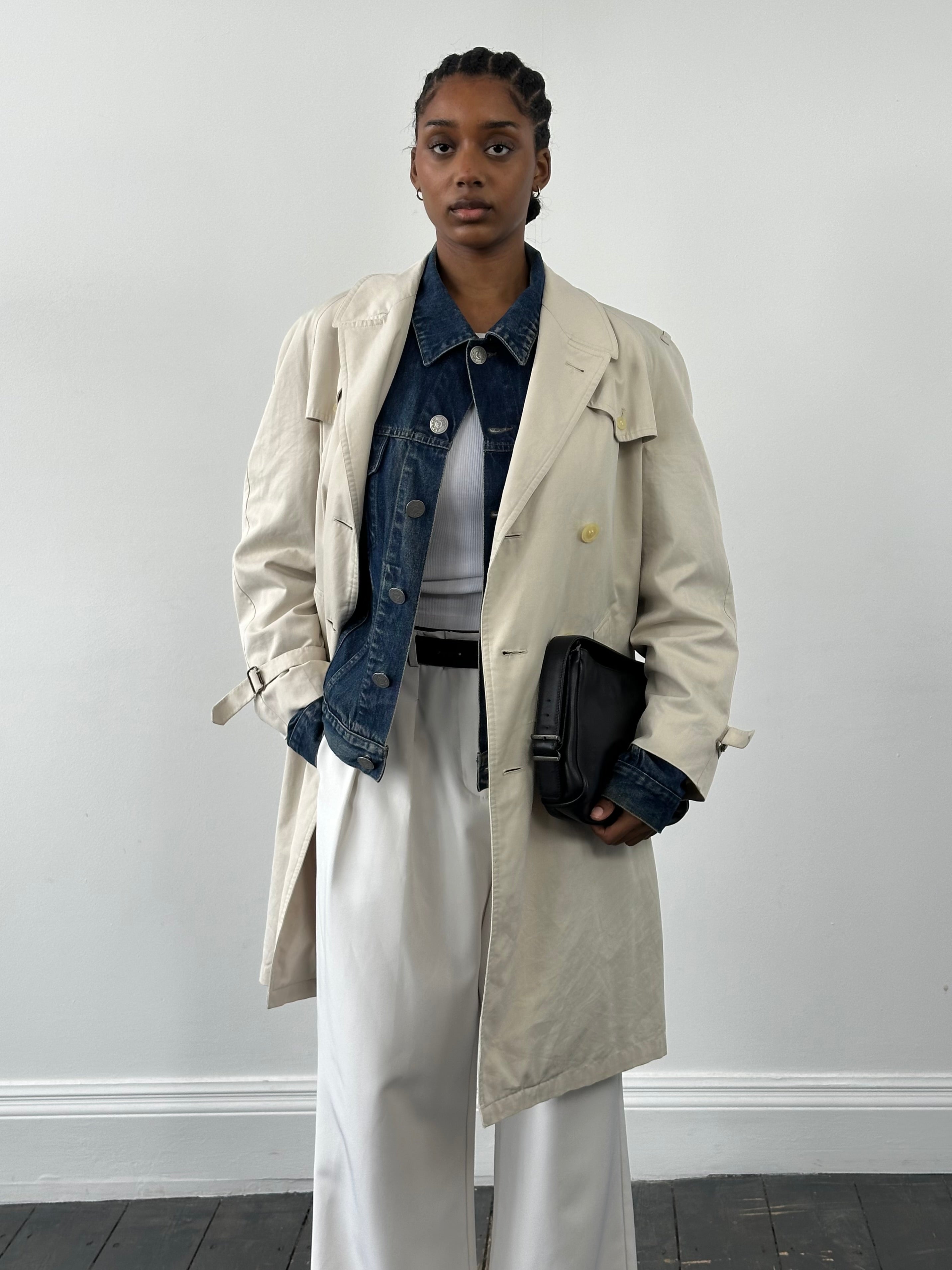 Burberry 1990s cotton double-breasted trench coat in beige, featuring classic collar and button details, size M/L.