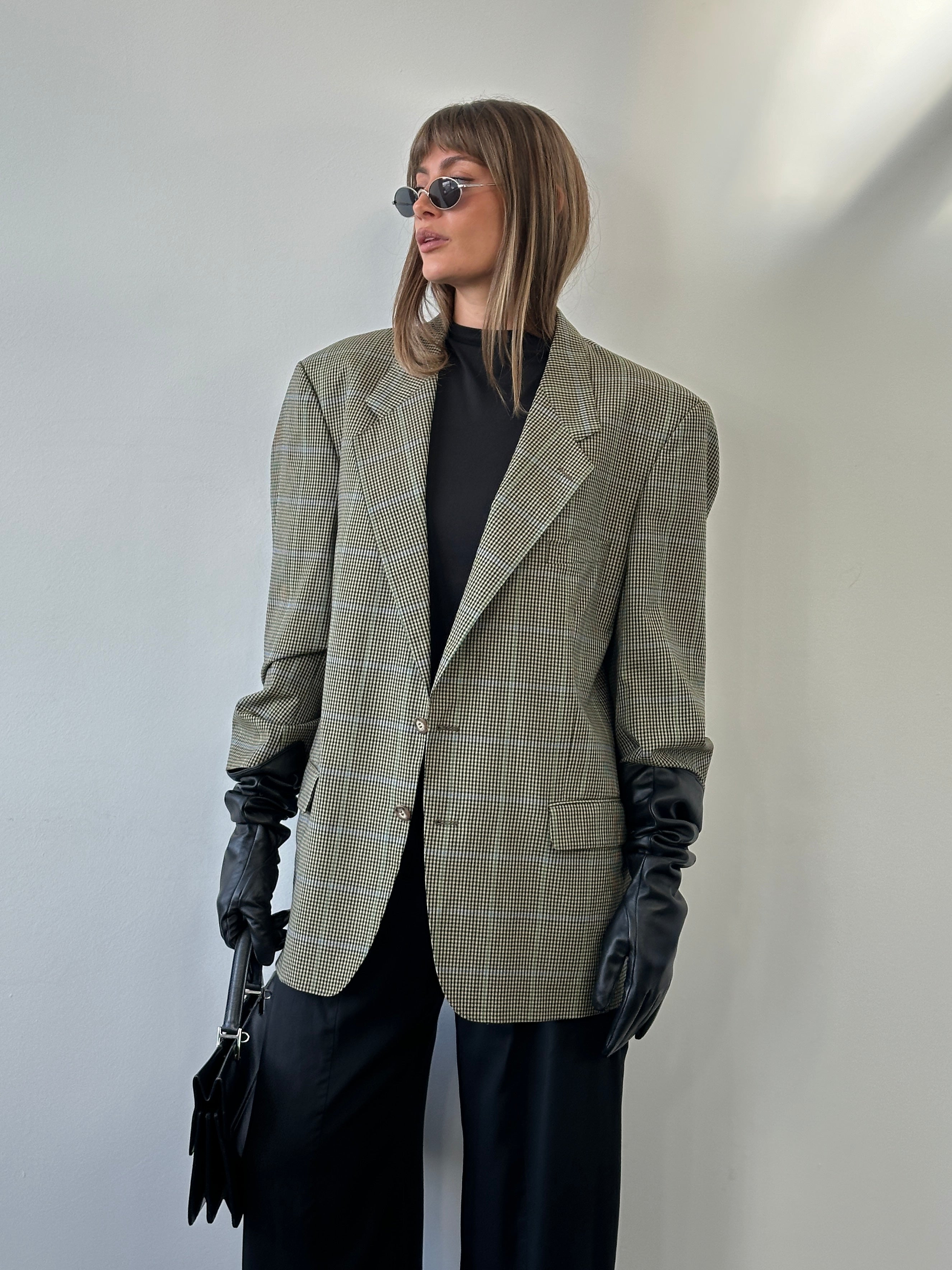 Yves Saint Laurent Pour Homme 1990s wool single-breasted check blazer in size 44R/XL, tailored fit with classic pattern.