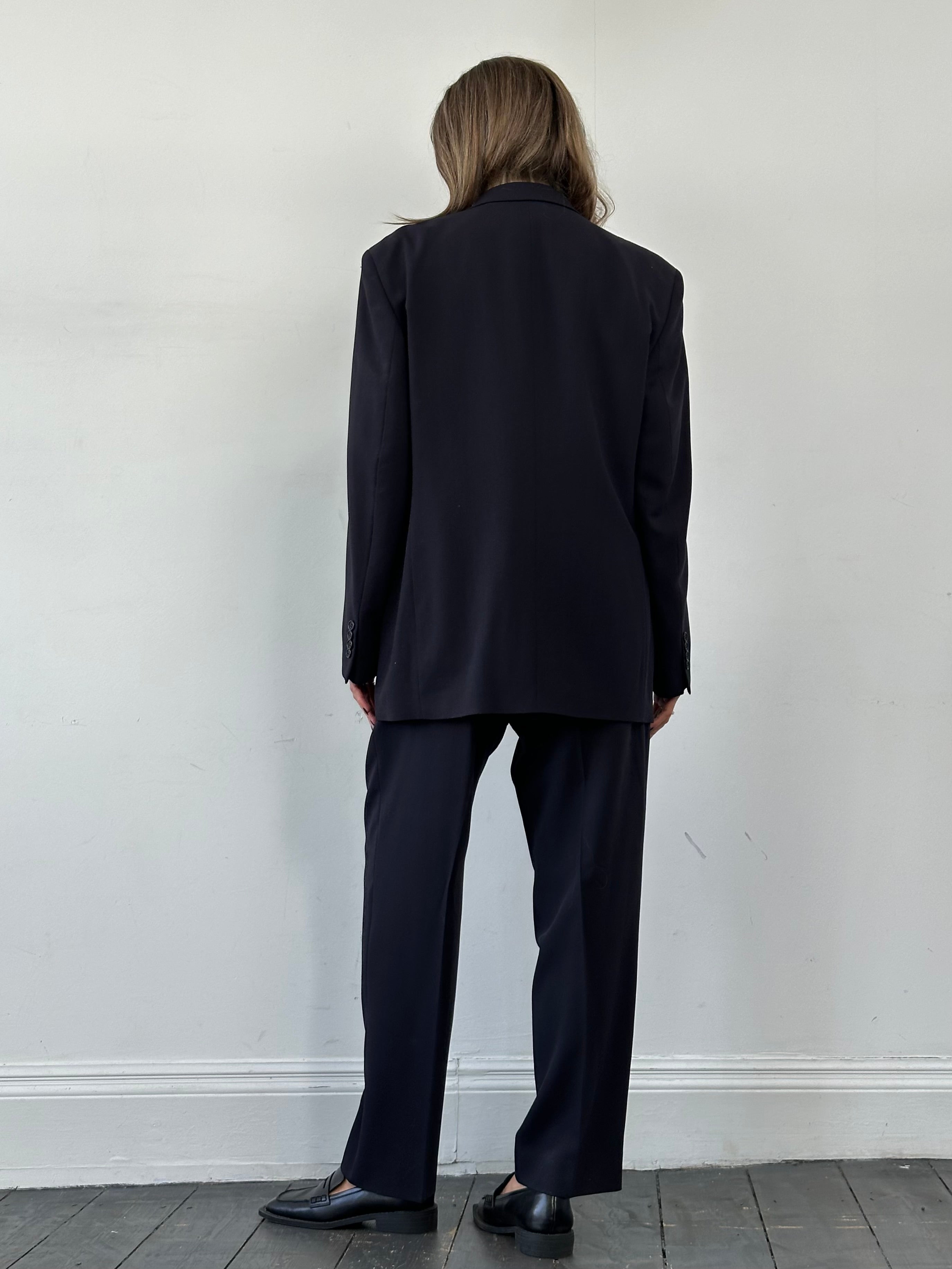 Yves Saint Laurent Pour Homme pure wool three-piece suit in size 44R/W36, tailored with a classic fit and elegant lapels.