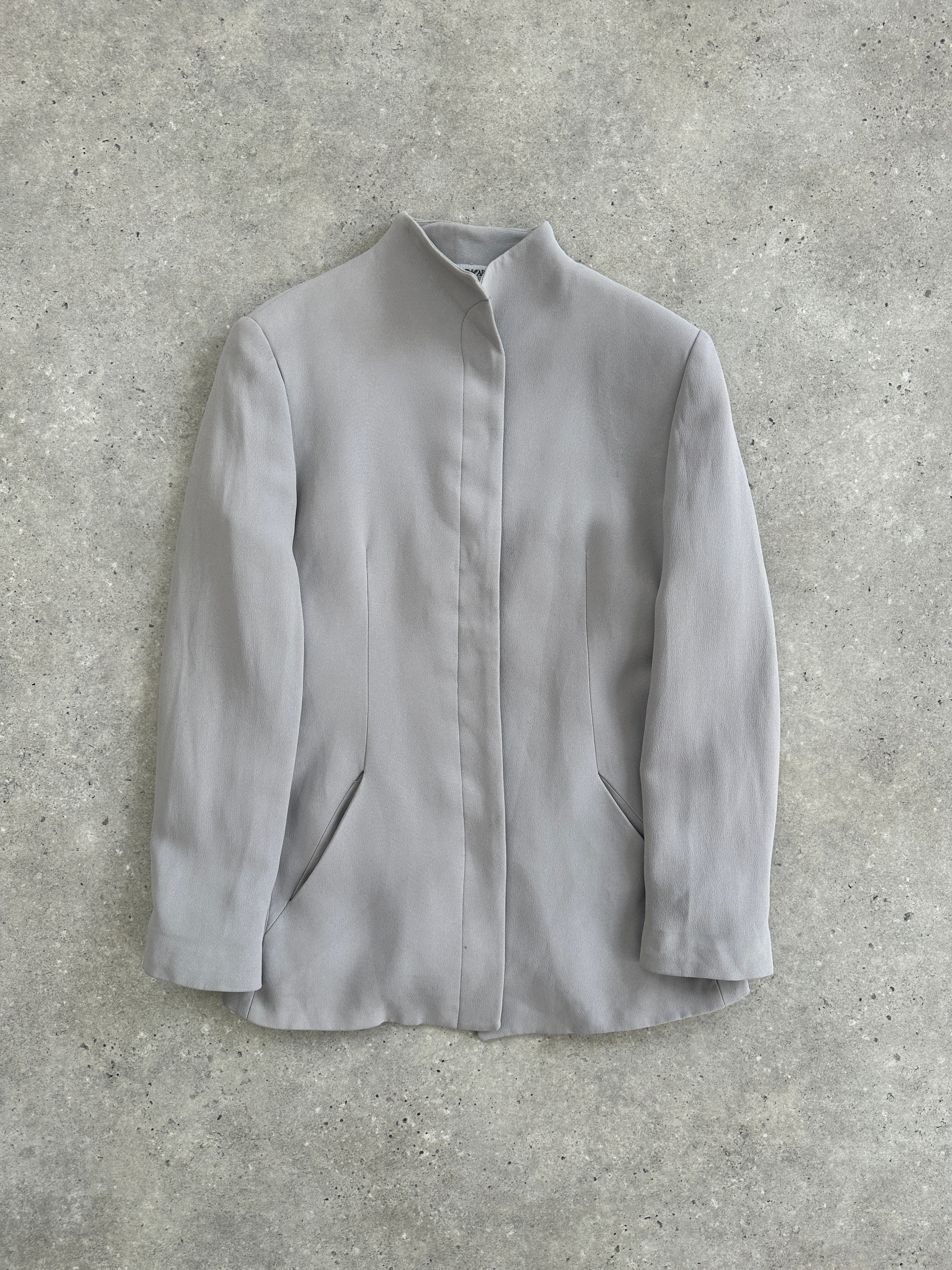 Emporio Armani high neck fitted blazer jacket in black, tailored design, slim fit, minimal style, displayed on a mannequin.