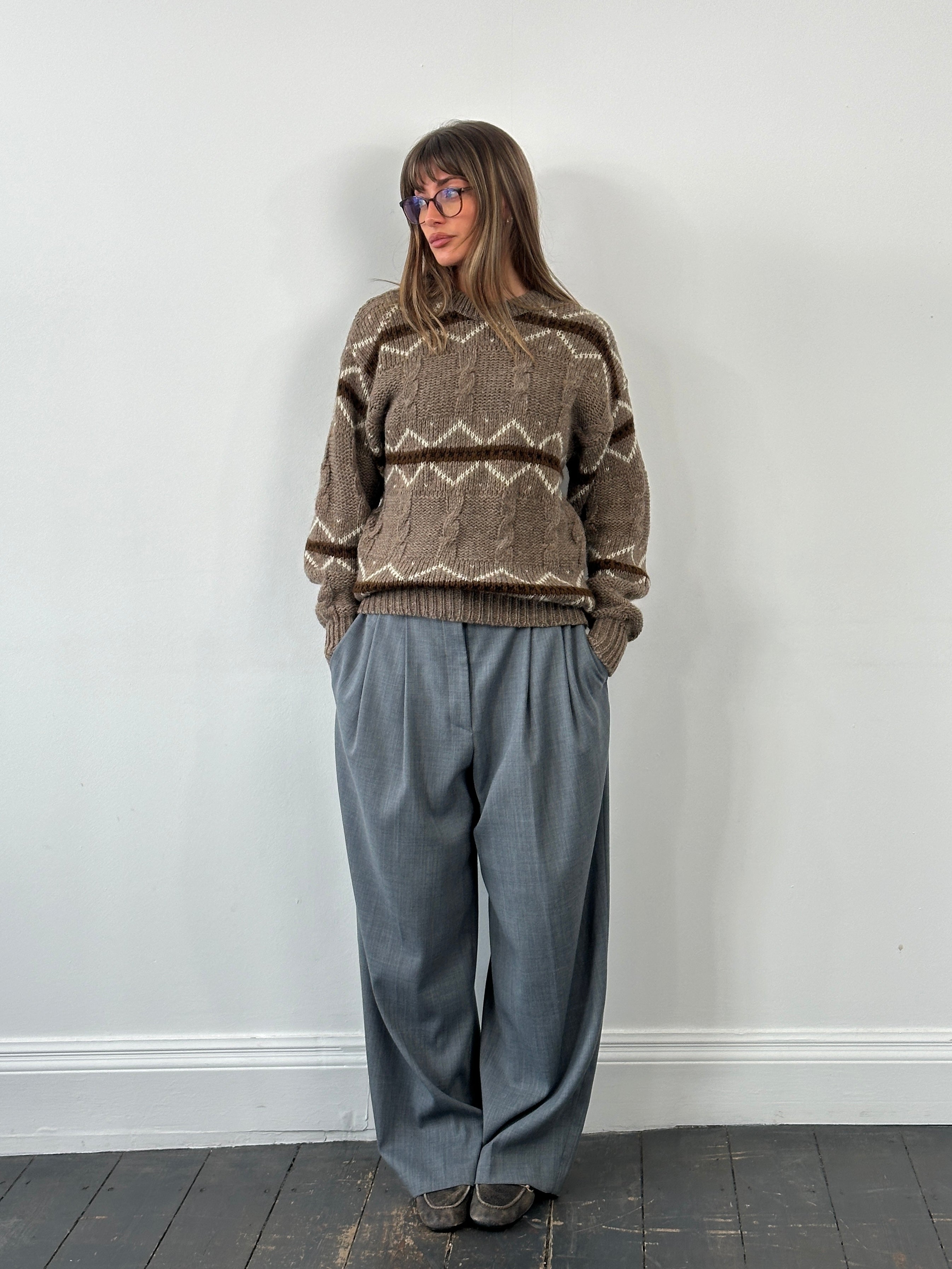 Vintage Italian 1990s chunky wool striped jumper, size large, featuring bold colorful knit pattern and cozy textured fabric.