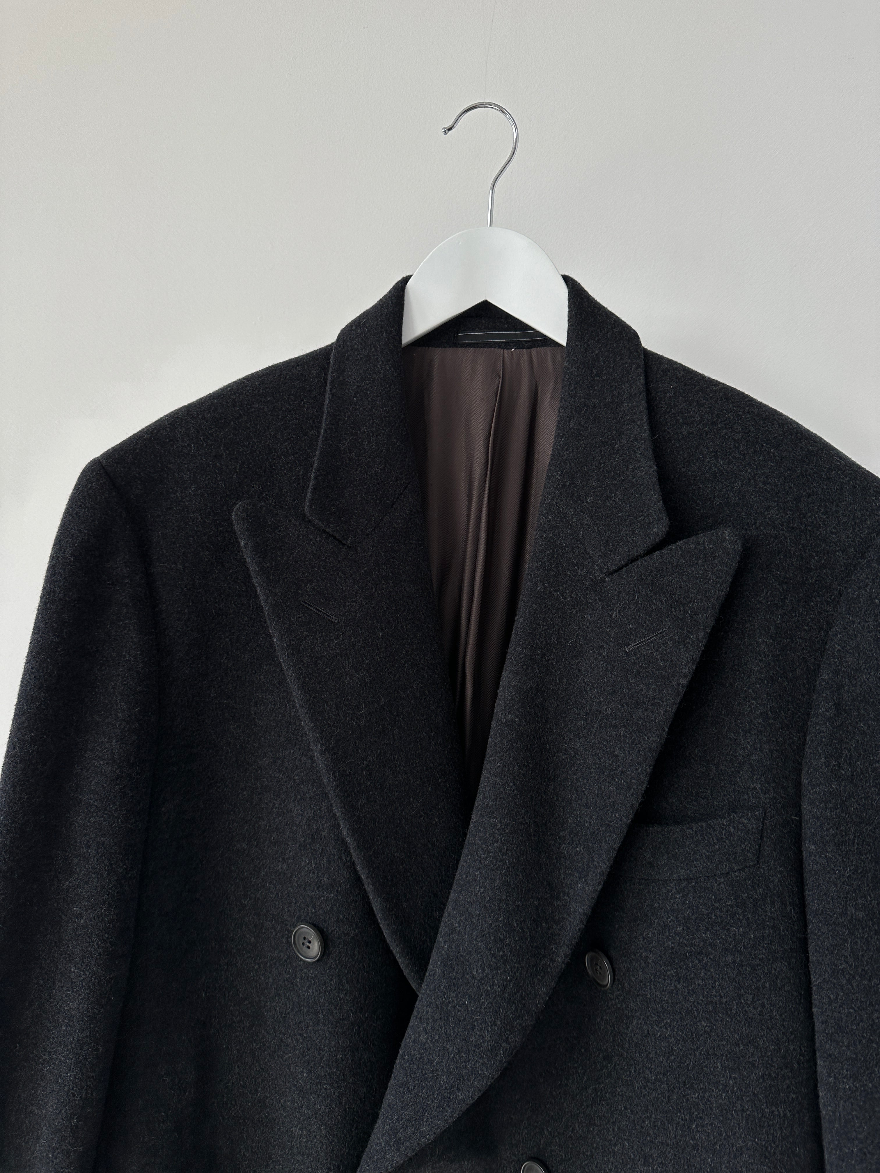 Vintage brand vintage cashmere wool double-breasted coat in size XL, showing classic design and textured fabric details.