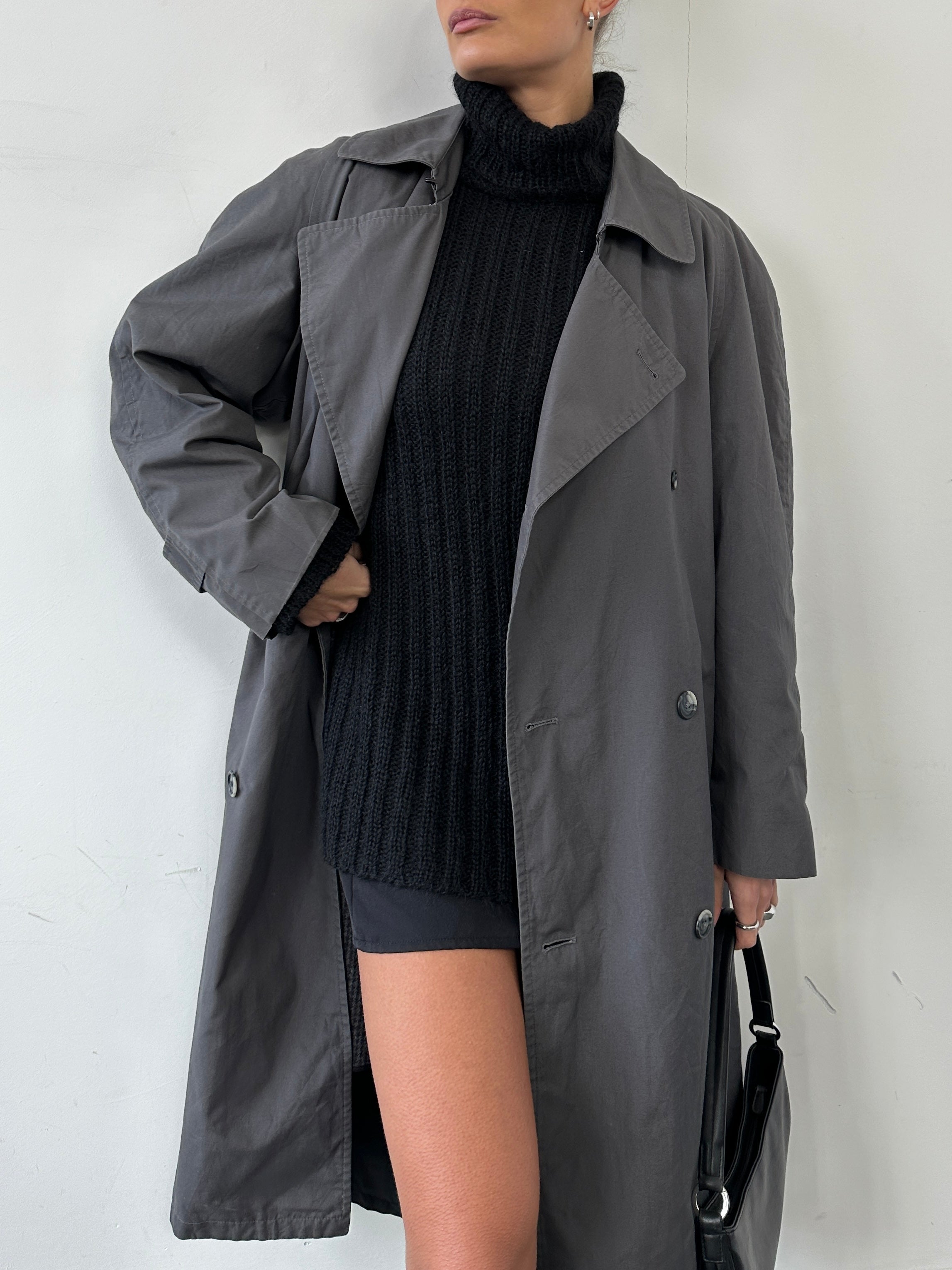 Christian Dior double-breasted trench coat in size L, featuring classic design, beige color, and stylish belt details.