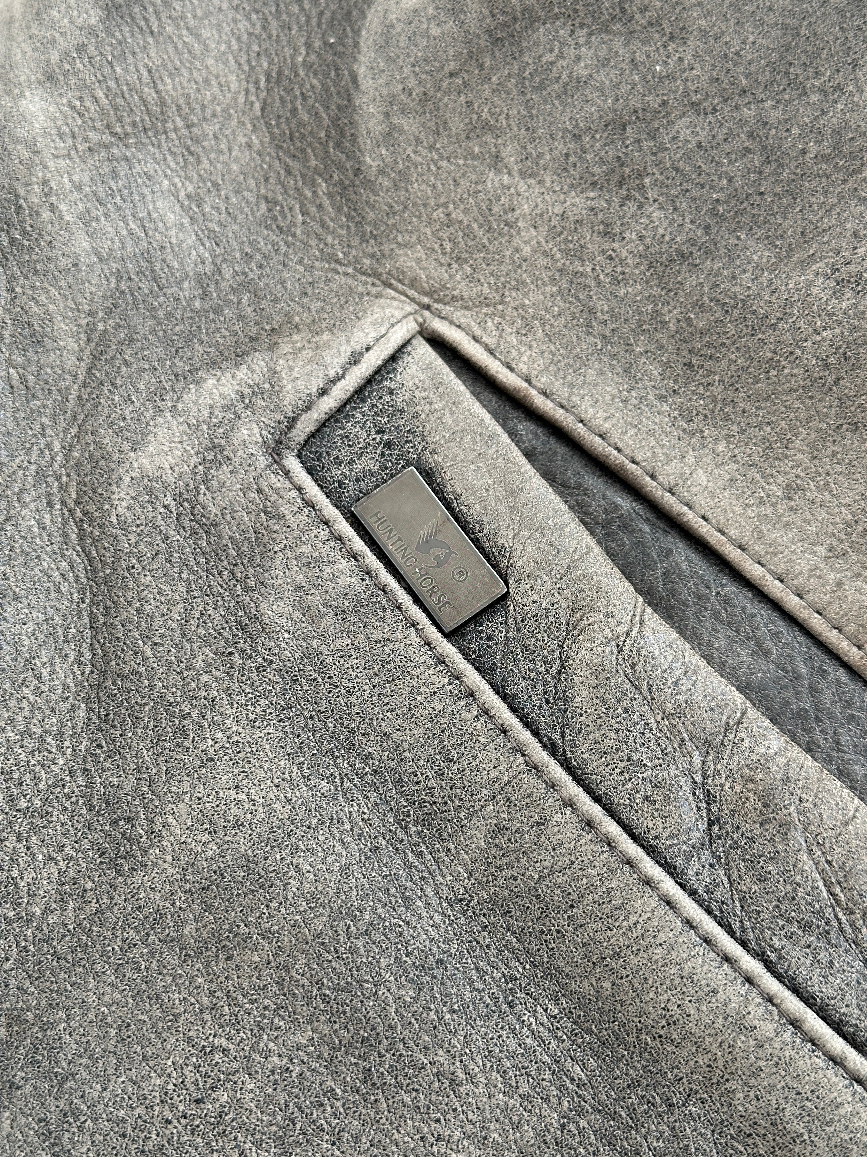 Vintage Italian 1990s aged leather jacket in XL, showcasing a classic distressed leather design and vintage craftsmanship.