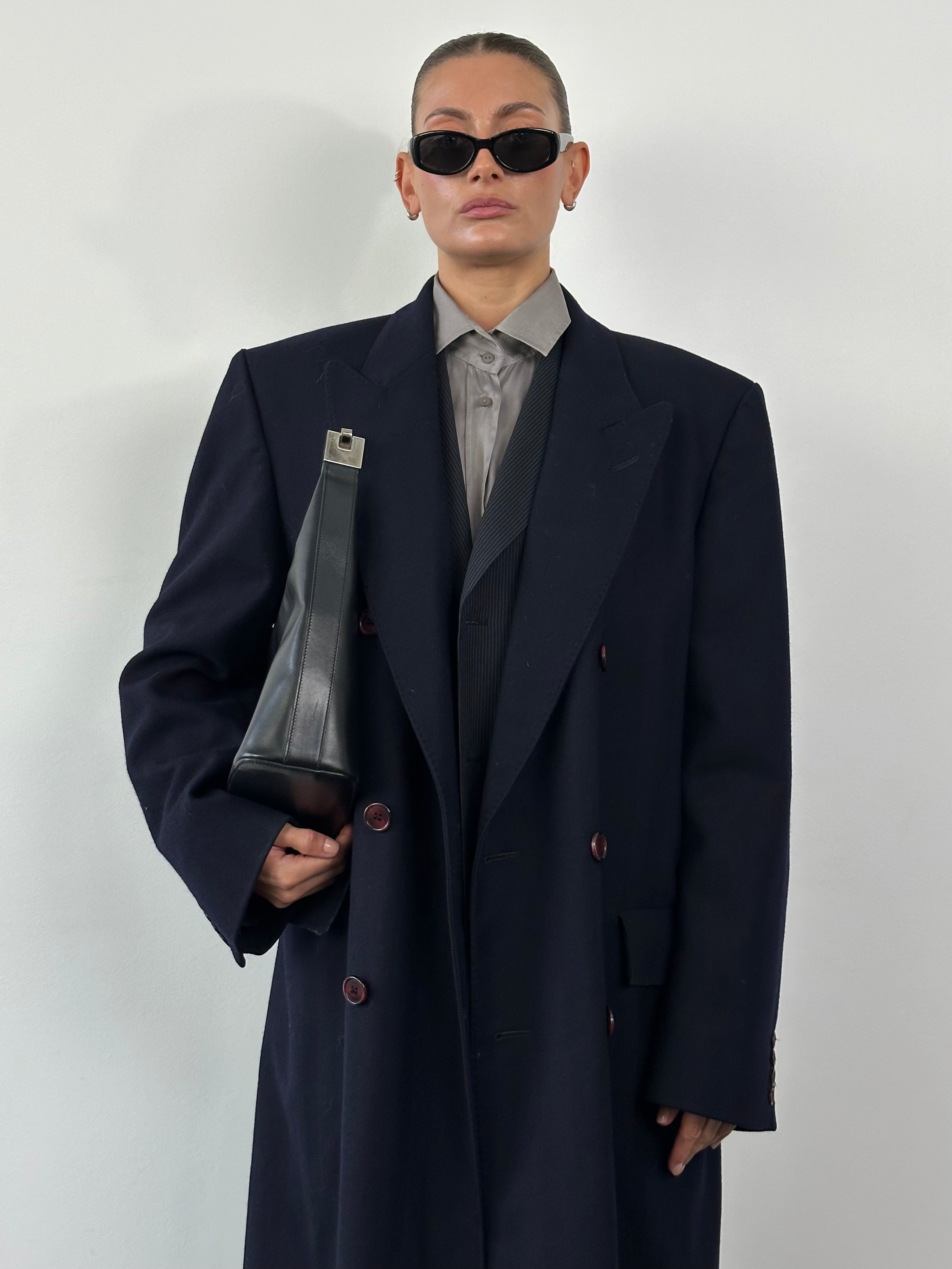 Christian Dior pure wool double-breasted coat in XL/XXL, shown in a front view with classic tailored style and neutral color.