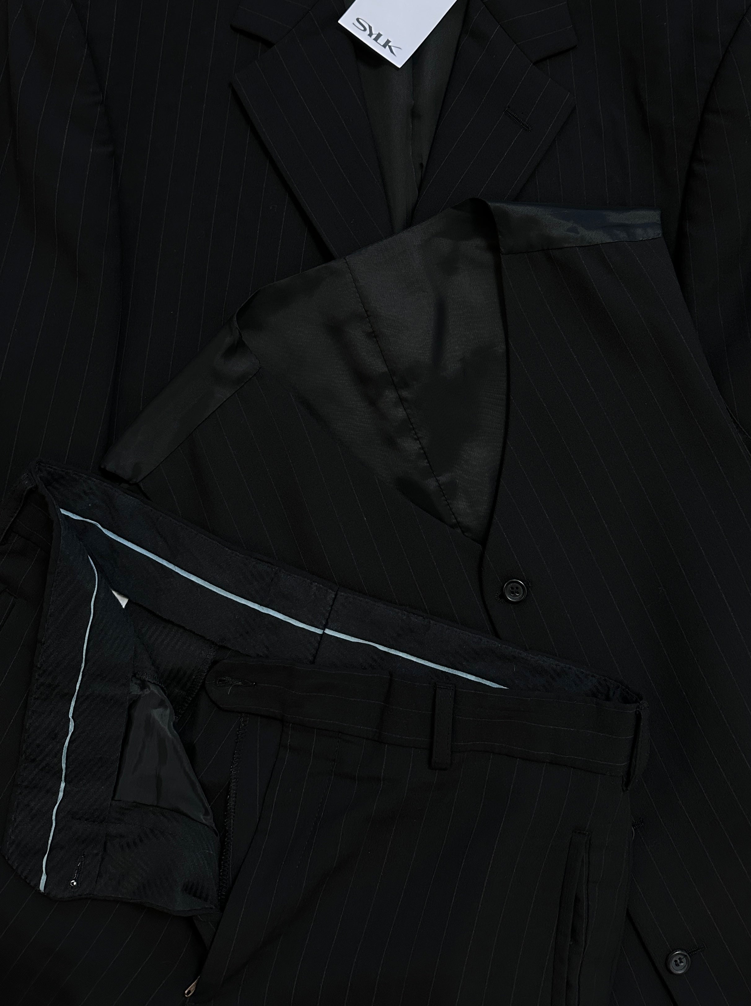 Vintage pinstripe wool three-piece suit, size 40R/W32, featuring tailored jacket, vest, and trousers in classic vintage style.