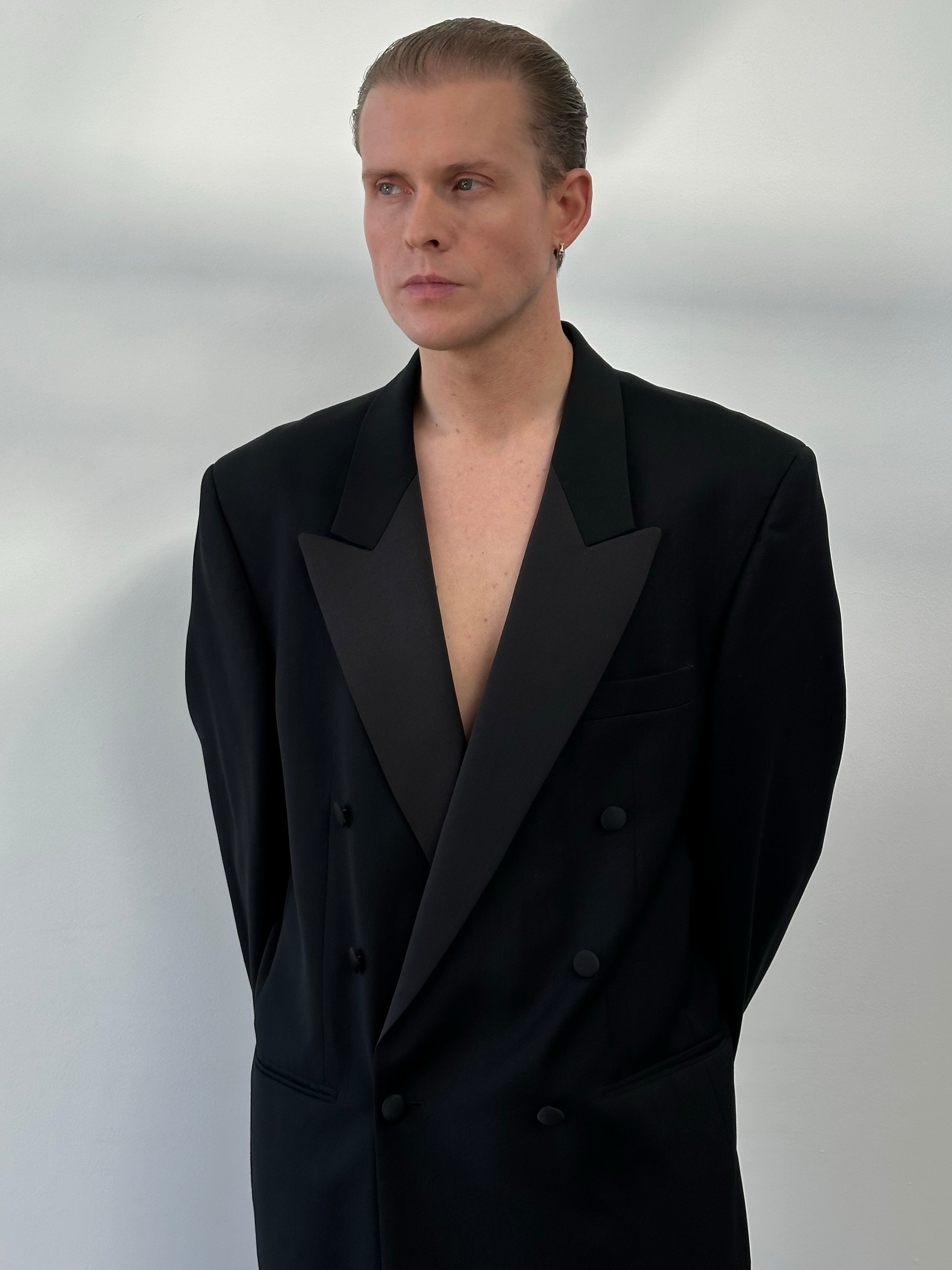 Pierre Cardin 1990s wool double-breasted tuxedo suit, front view showing tailored fit and classic design, size 46R/W32.