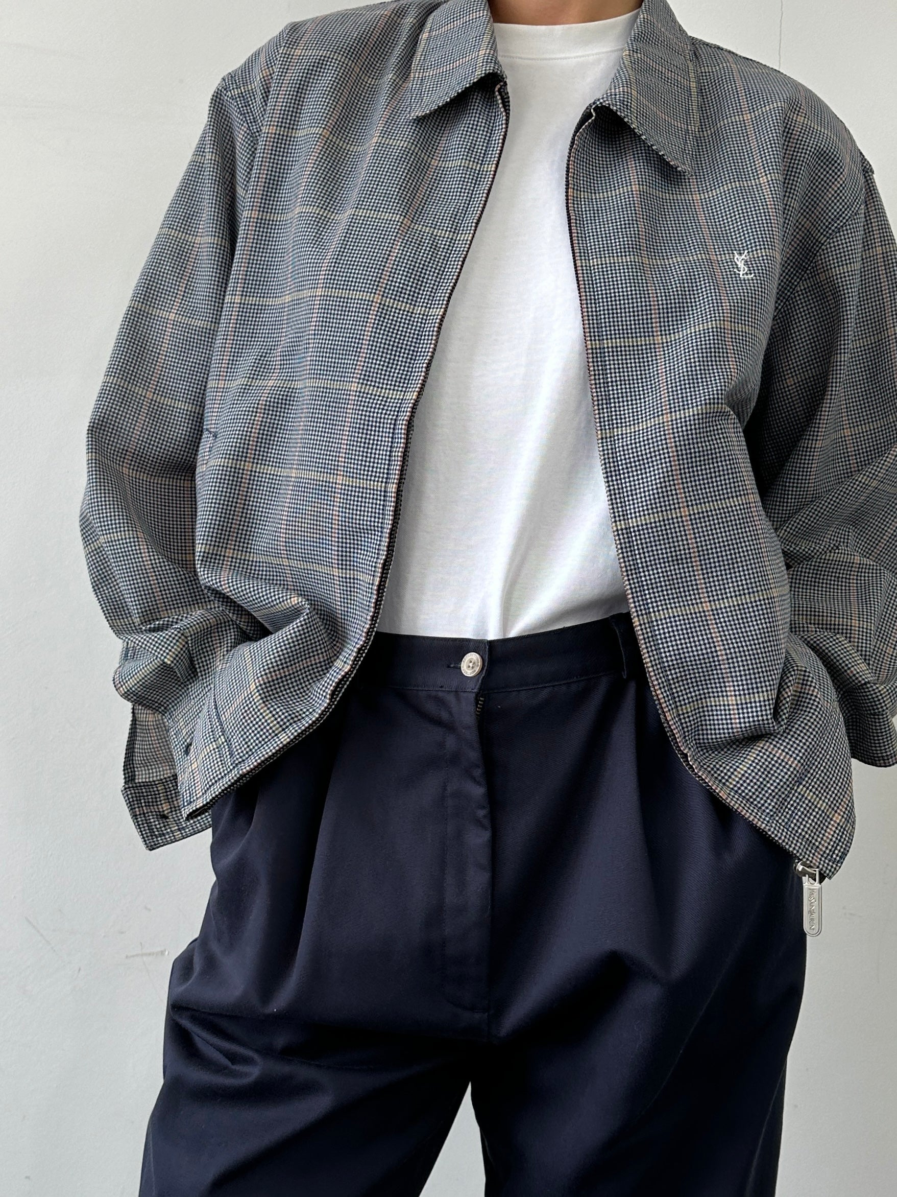 Yves Saint Laurent Pour Homme check logo bomber jacket in black with ribbed cuffs and front zipper, size large.