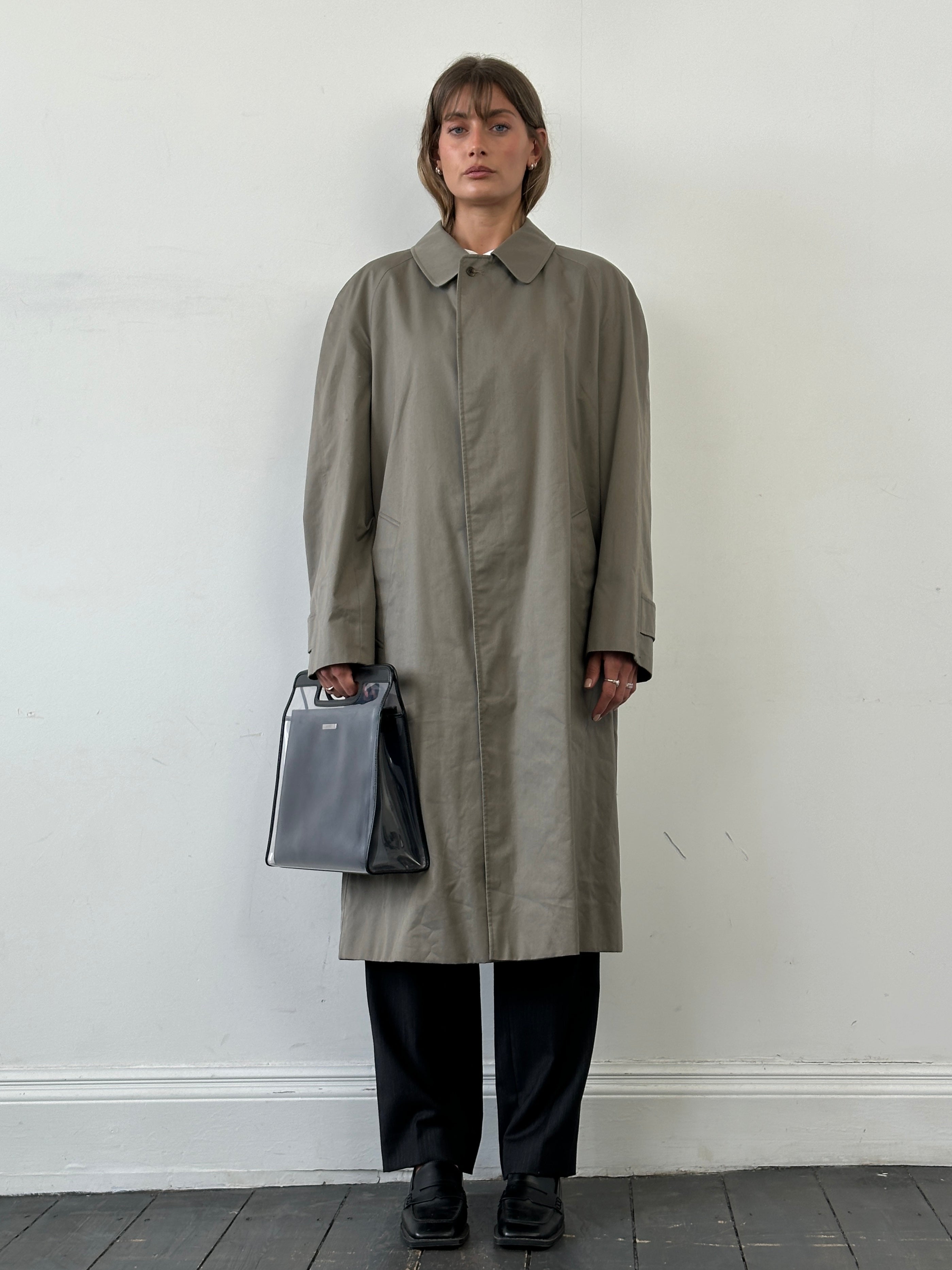 Aquascutum cotton trench coat with concealed placket in size XL, classic beige color and tailored fit.