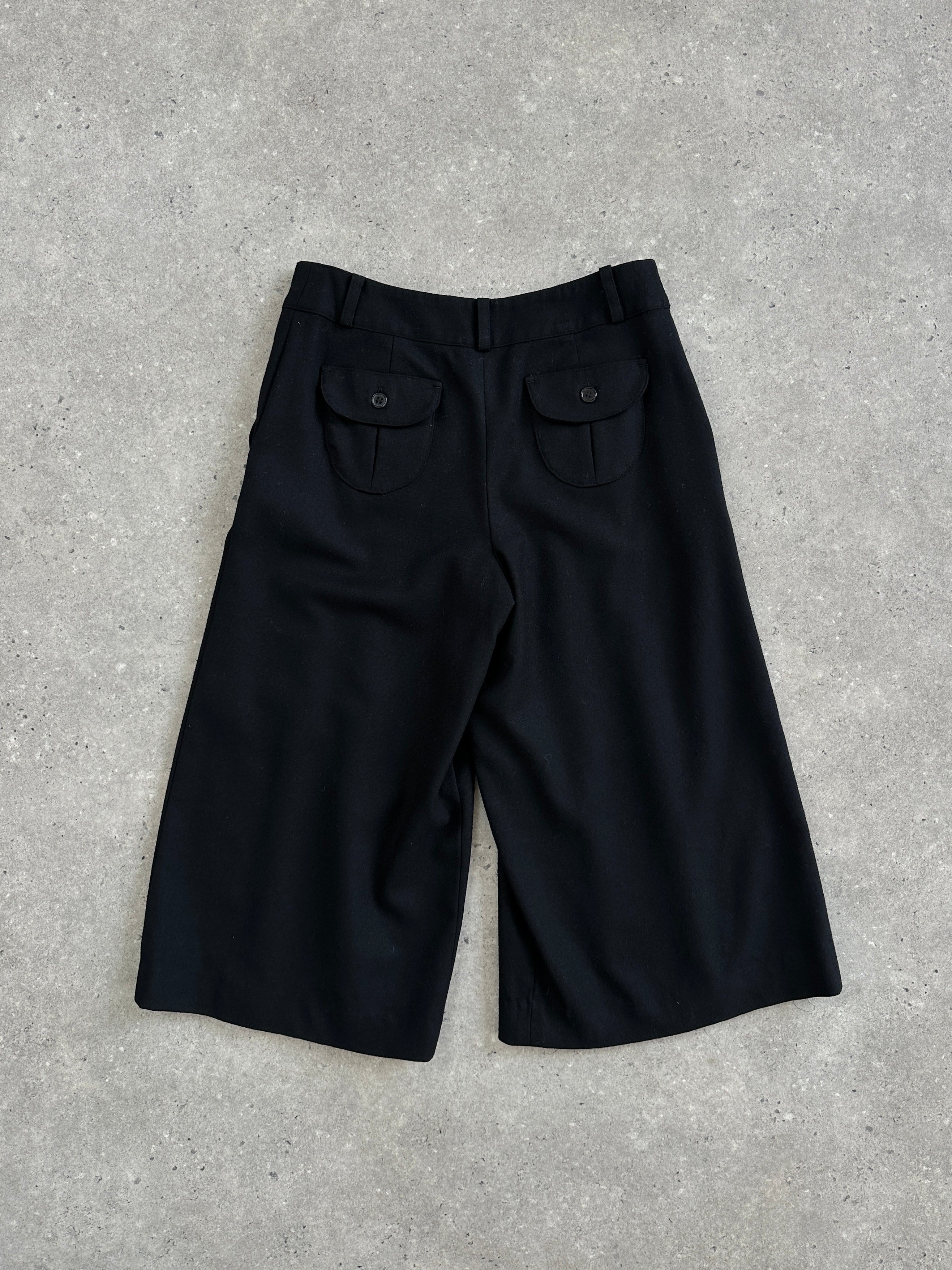 Vintage 1990s wool pleated culottes shorts in a classic style, featuring a high waist and wide-leg design.