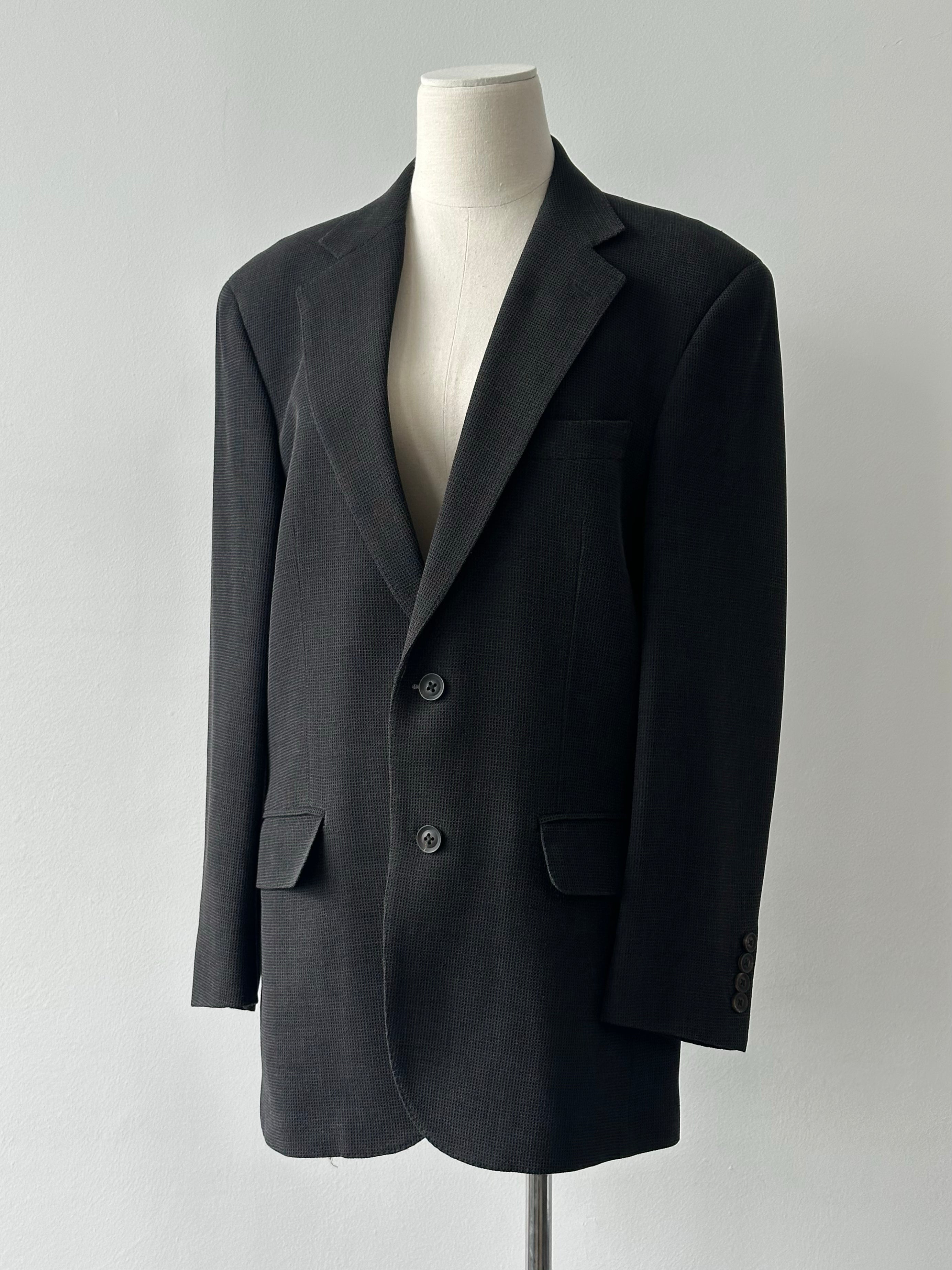 Burberry London 2000s wool single-breasted woven blazer in size M, tailored fit with classic check pattern and structured design.