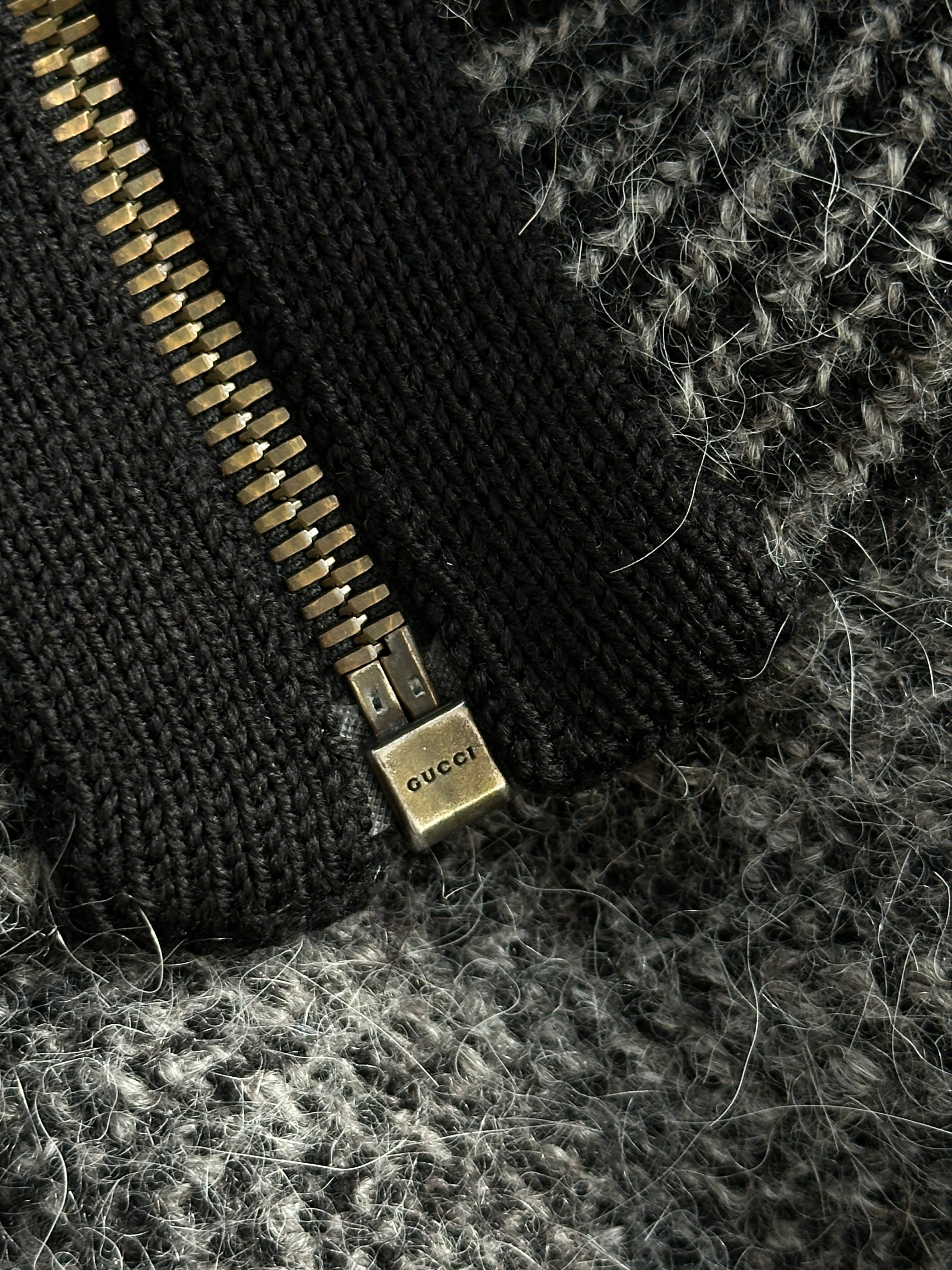 Gucci wool mohair logo patch cardigan in size S, featuring a cozy knit fabric and distinctive Gucci branding on the chest.