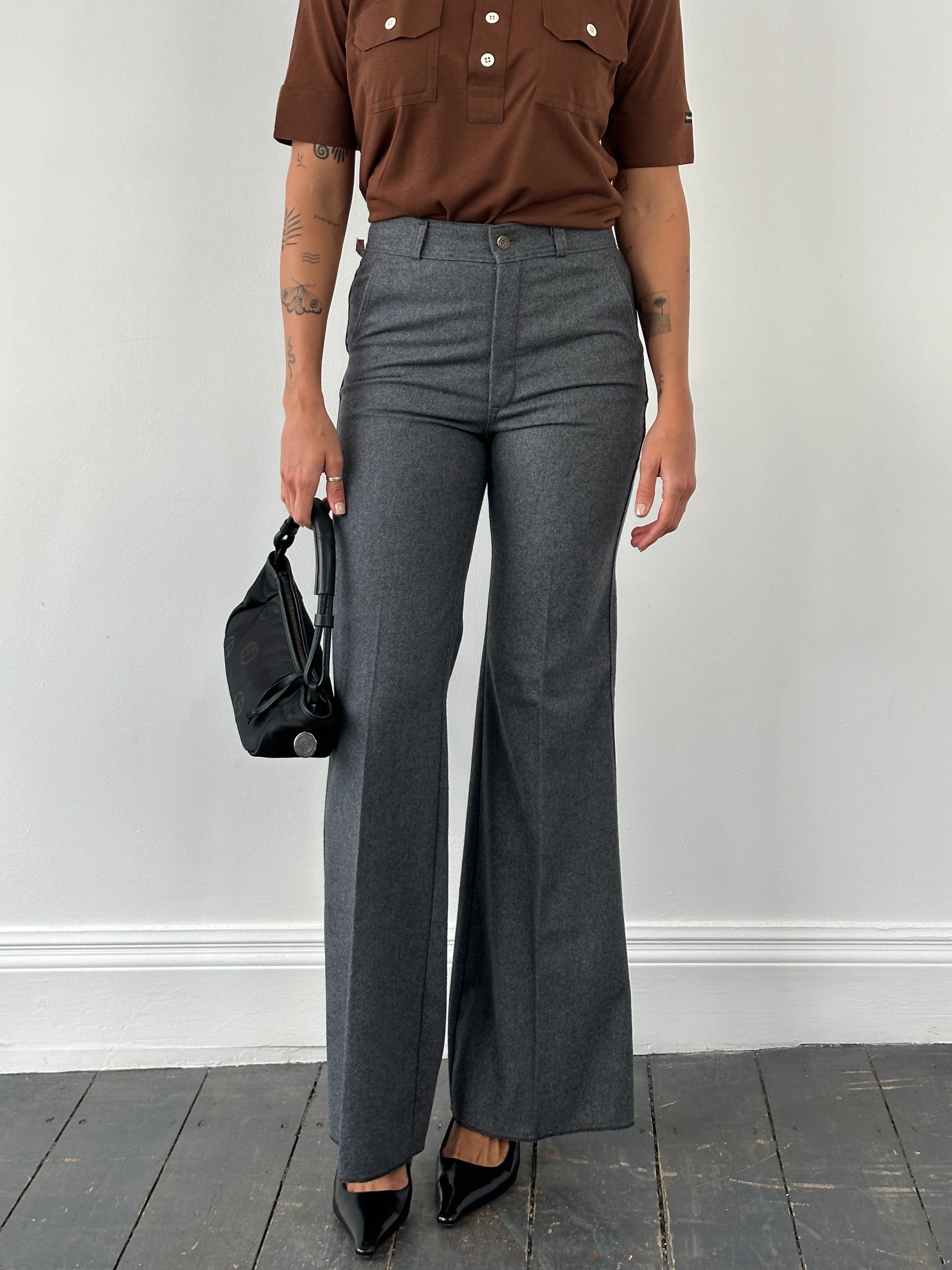 Vintage Italian 1970s wool flared tailored trousers, W28, featuring high waist and classic retro style.