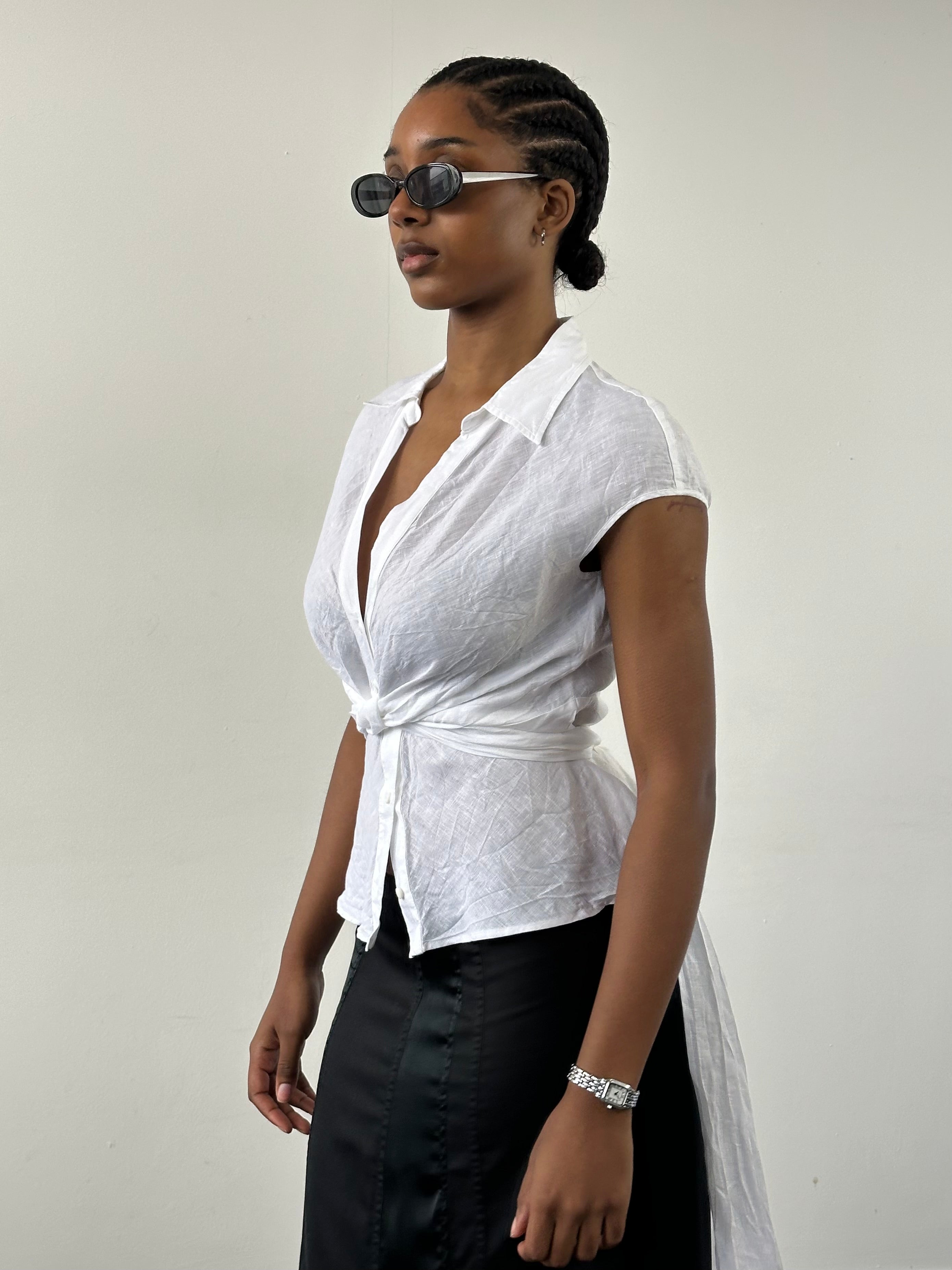 Max Mara 2000s pure linen sleeveless wrap shirt in S/M, light-colored fabric with a tie front and classic shirt collar.