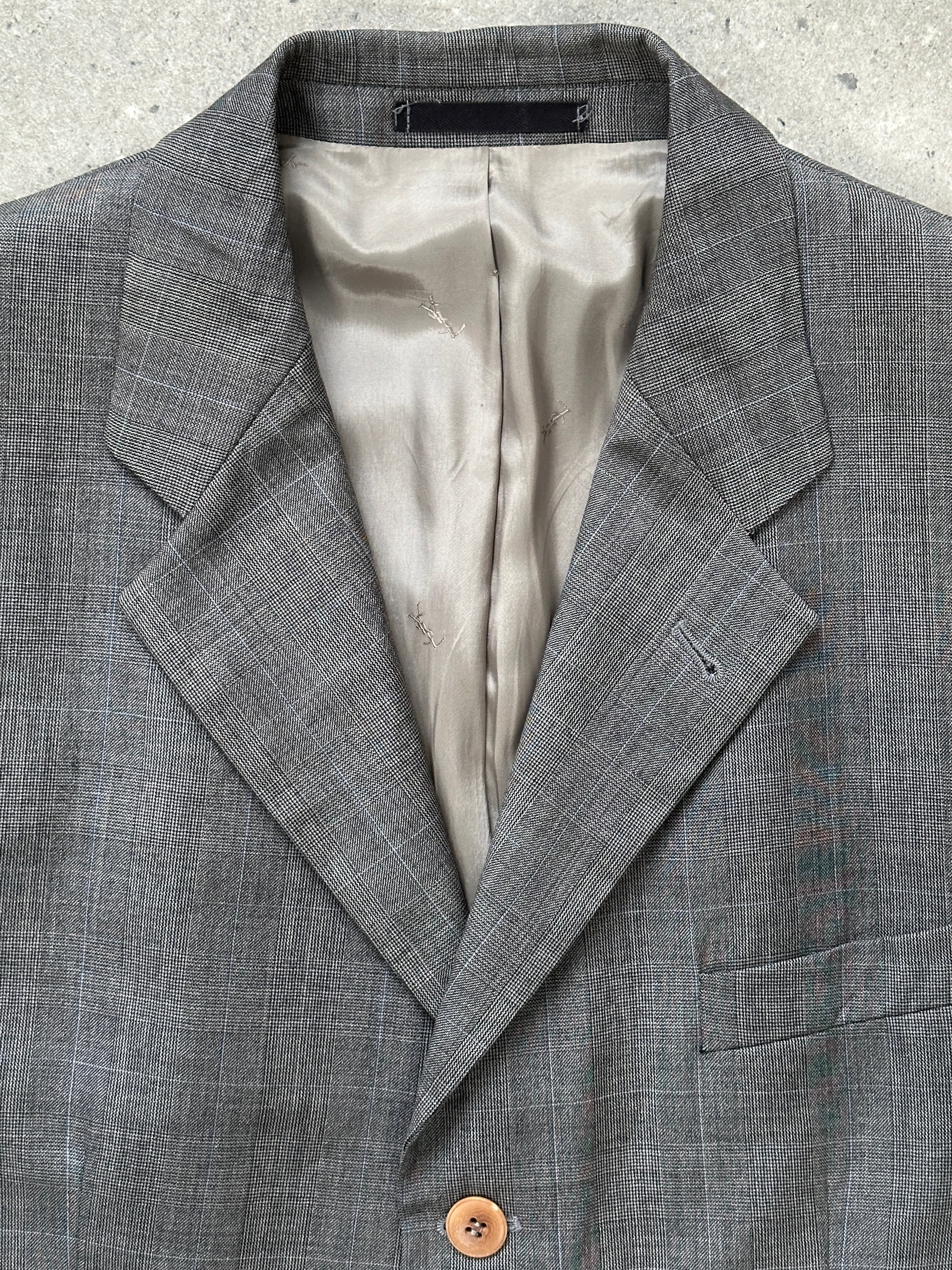 Yves Saint Laurent Pour Homme 1990s pure wool single-breasted blazer in size 40R/L, navy blue with classic lapel and button closure.