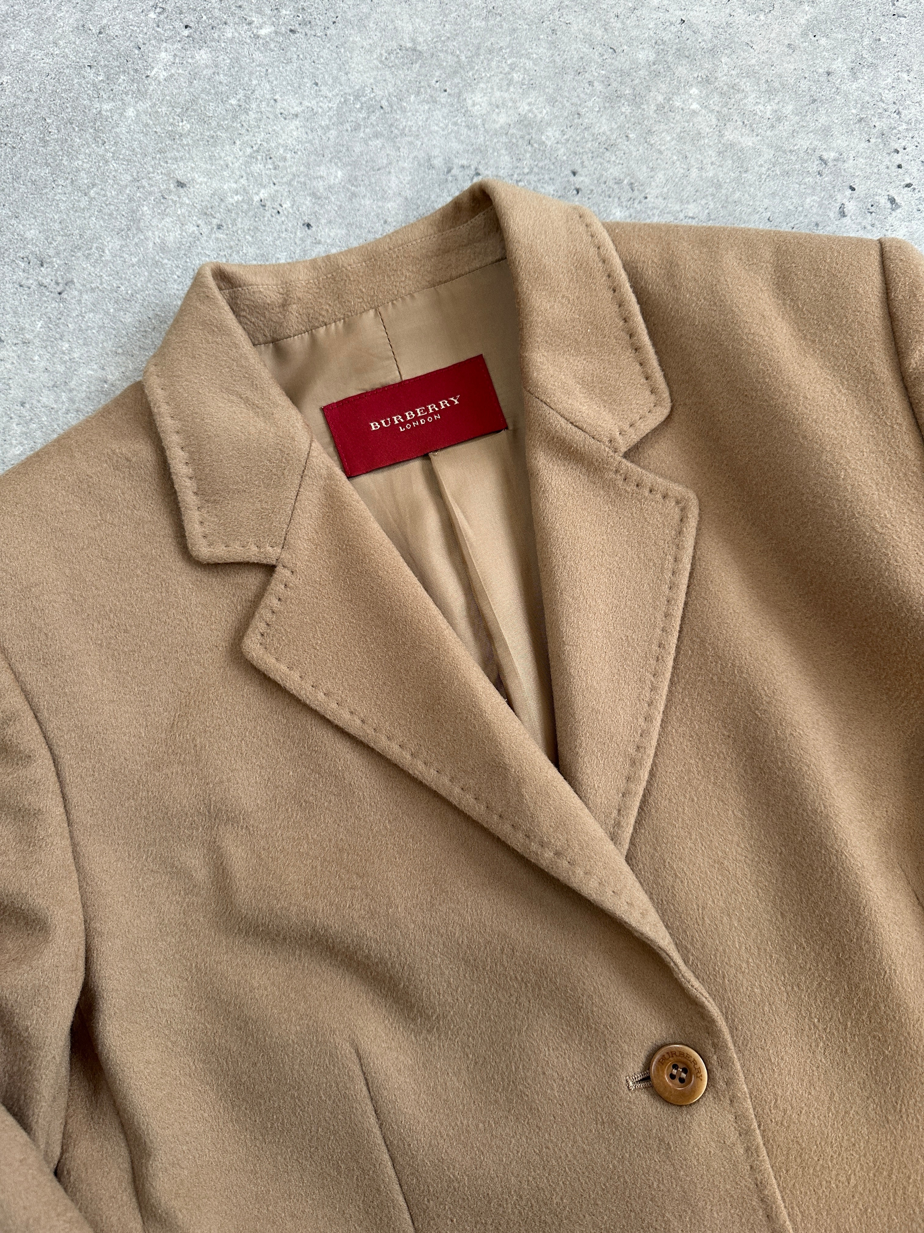 Burberry 2000s brushed pure wool single-breasted blazer in size S/M, tailored fit with classic lapels and button closure.