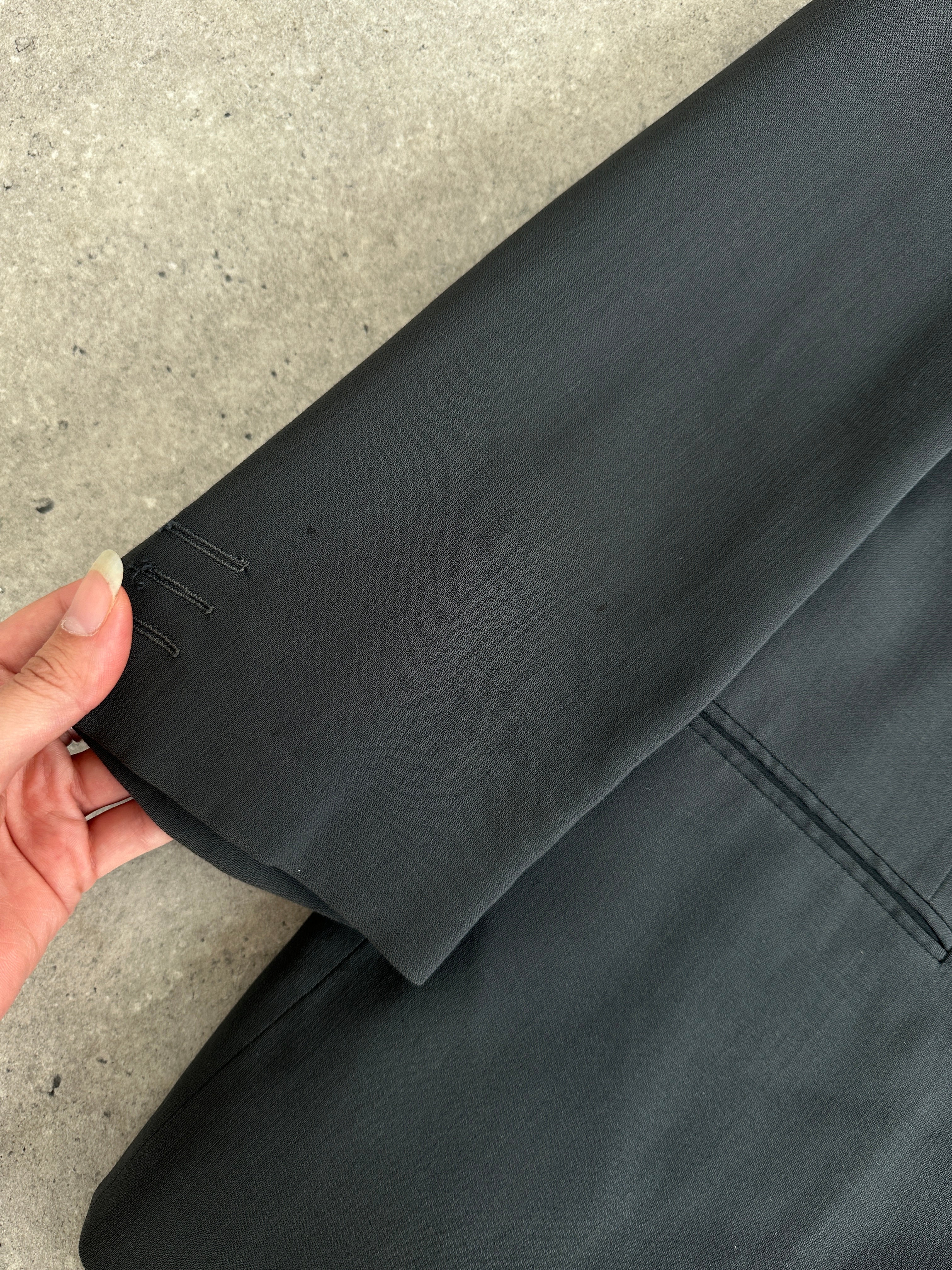 Giorgio Armani Le Collezioni wool relaxed single-breasted suit jumpsuit in size 42R/W34, tailored fit with lapel collar and structured design.