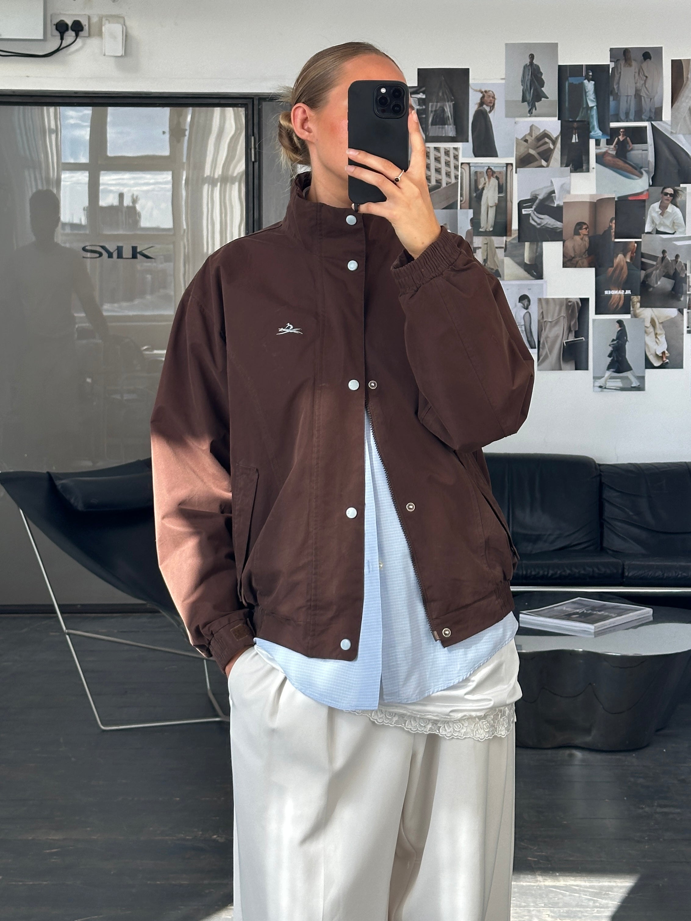 Vintage 2000s double zip boxy bomber jacket in black, featuring a modern oversized fit and classic style.