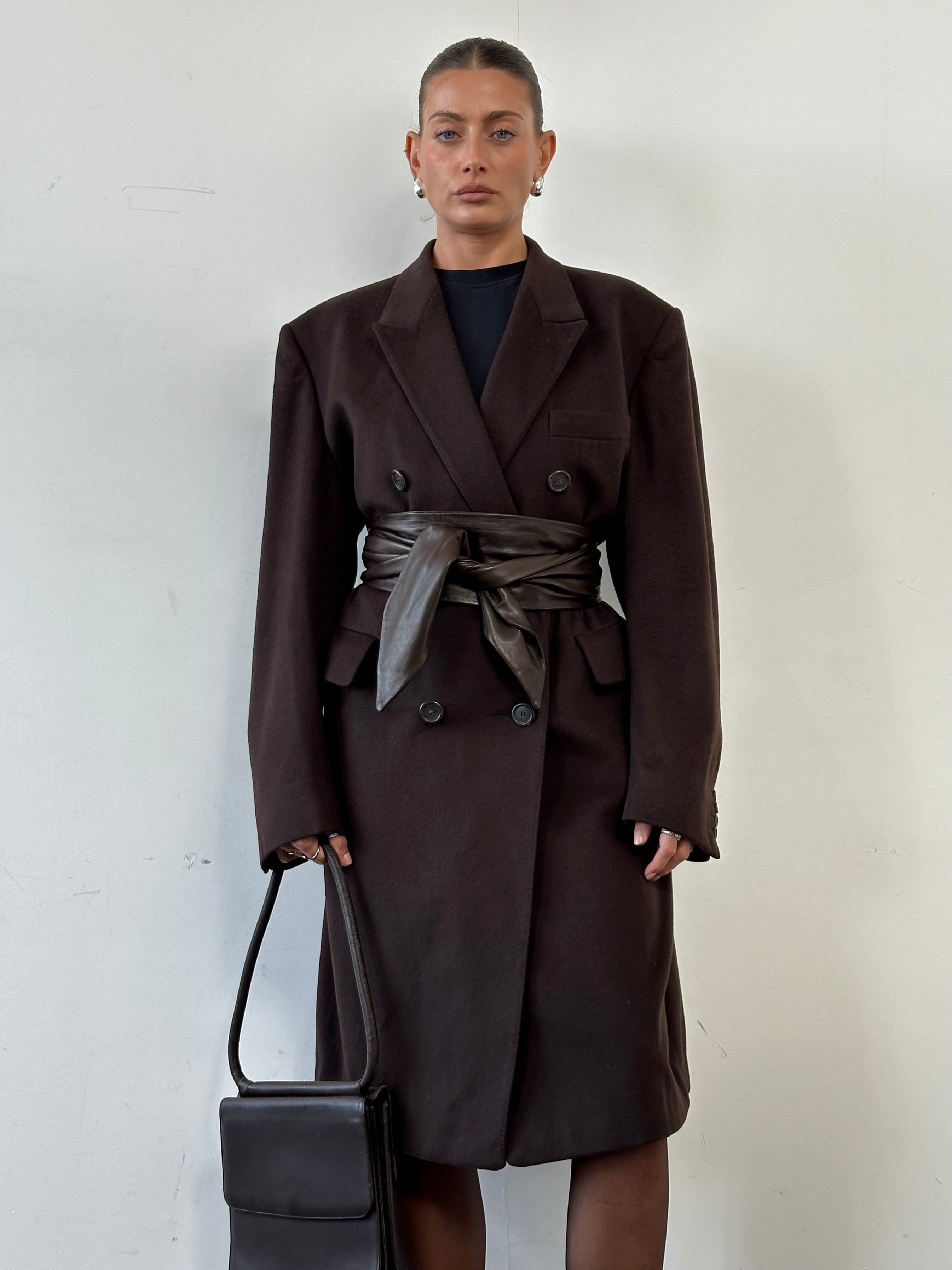 Christian Dior wool cashmere double-breasted coat in XL, displayed on a hanger with front view and classic design details.