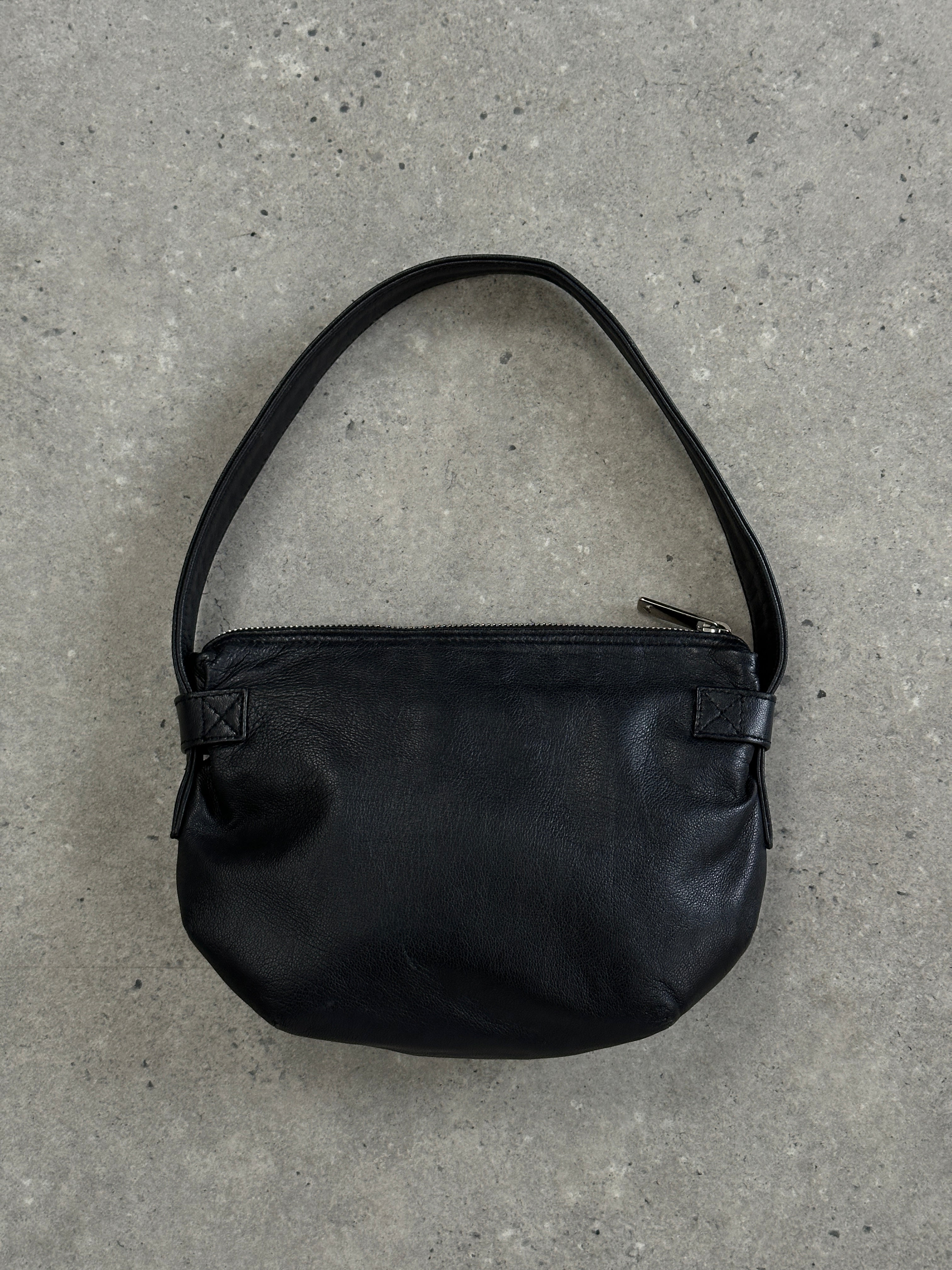 Emporio Armani leather shoulder bag with sleek design, featuring a smooth leather finish and adjustable strap for versatile styling.