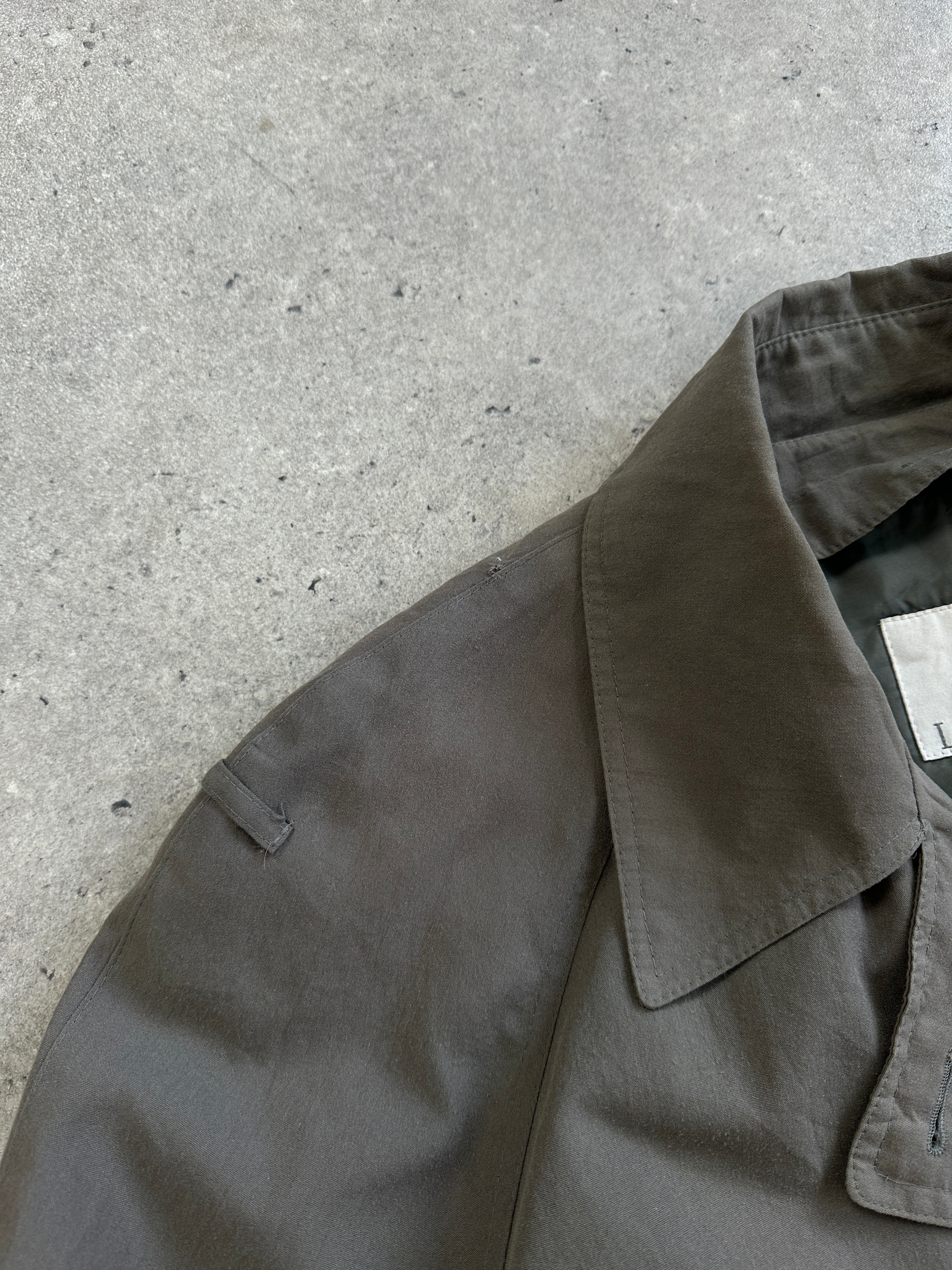 London Fog double-breasted trench coat in S/M, featuring classic design with belt and button details, shown on a mannequin.