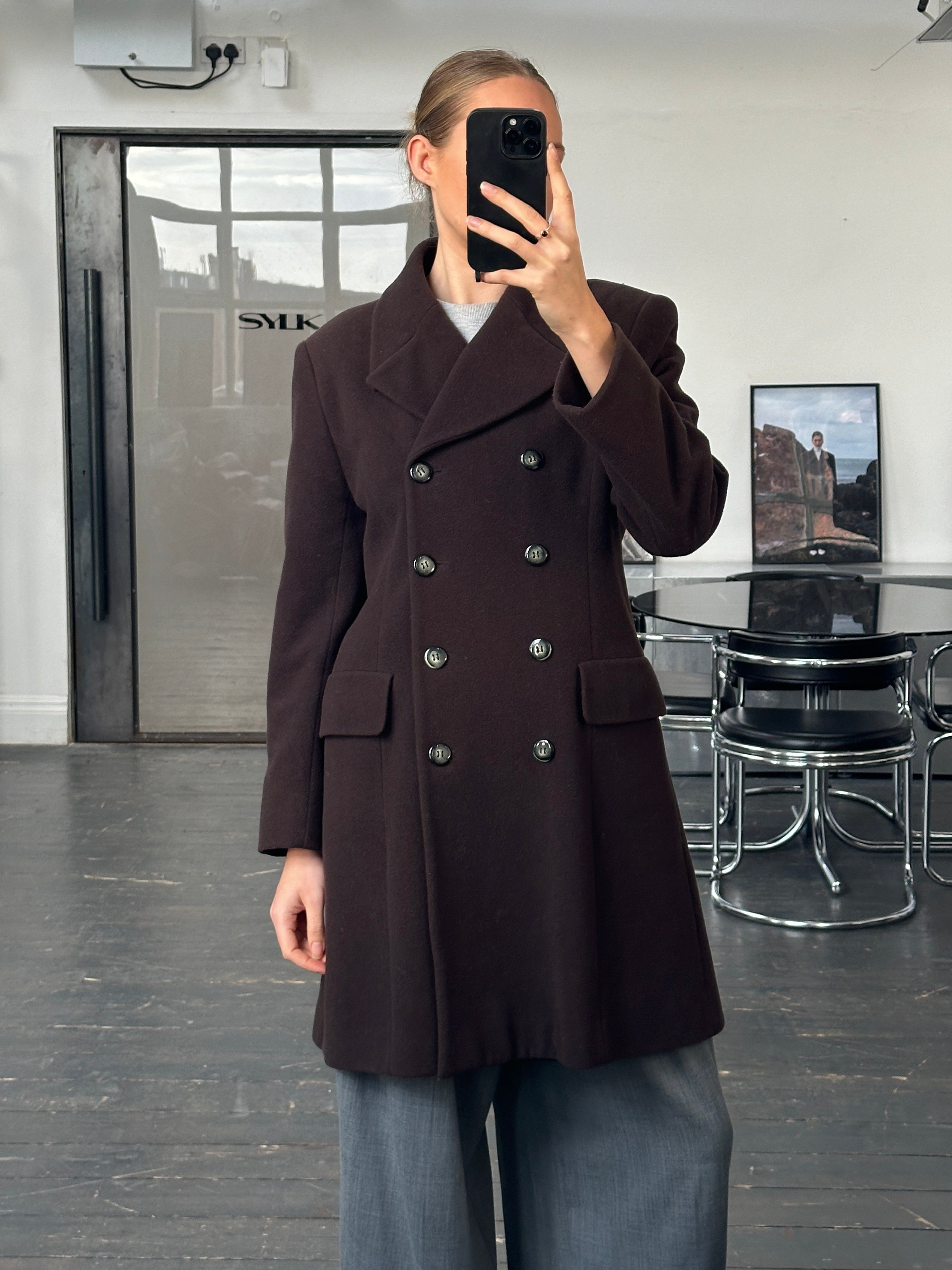 Vintage 1990s wool cashmere double-breasted coat in size M, featuring classic design and textured fabric.