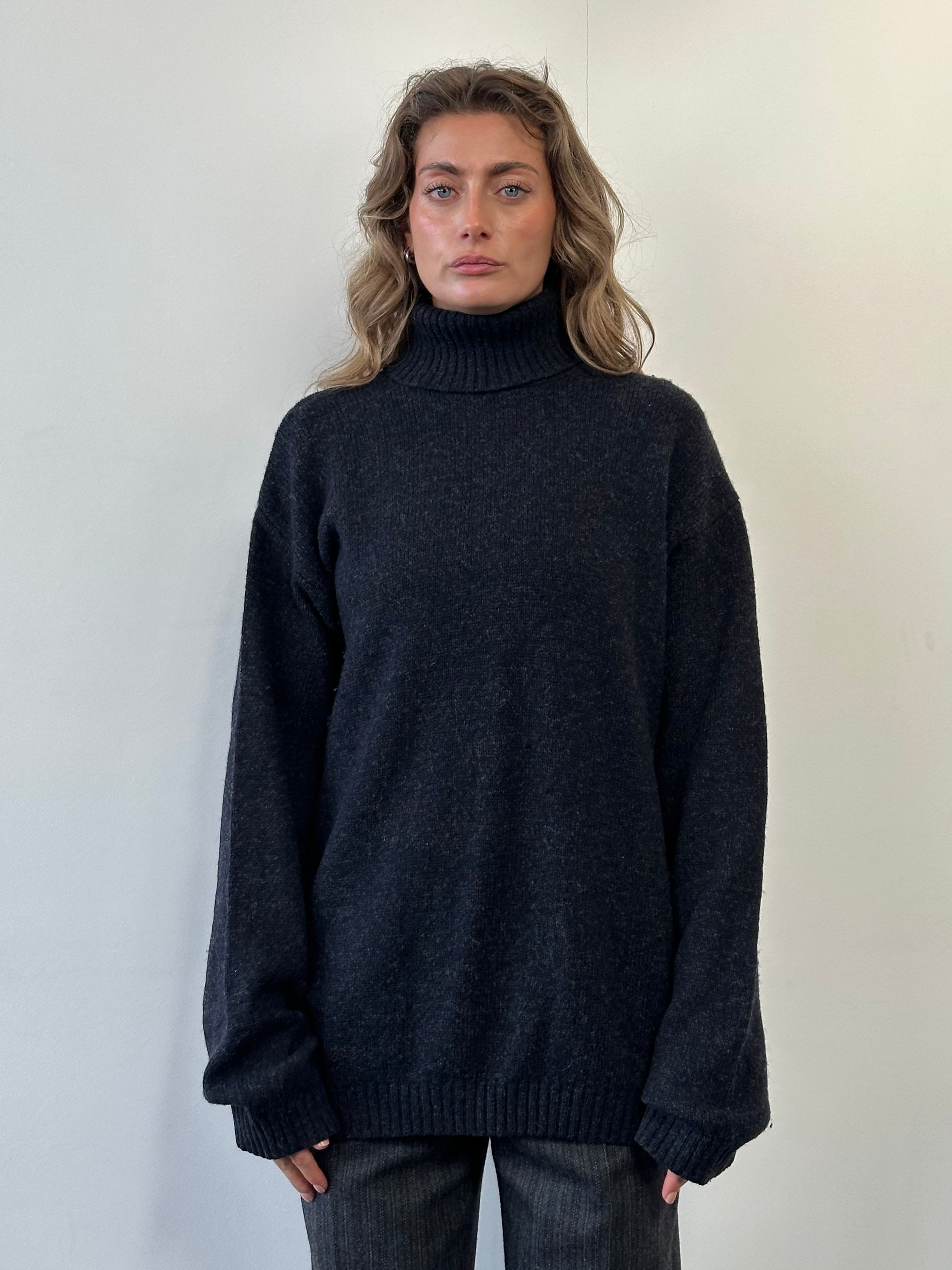 Armani Jeans pure wool roll neck jumper in XL, featuring a cozy knit design and classic fit, perfect for winter wear.