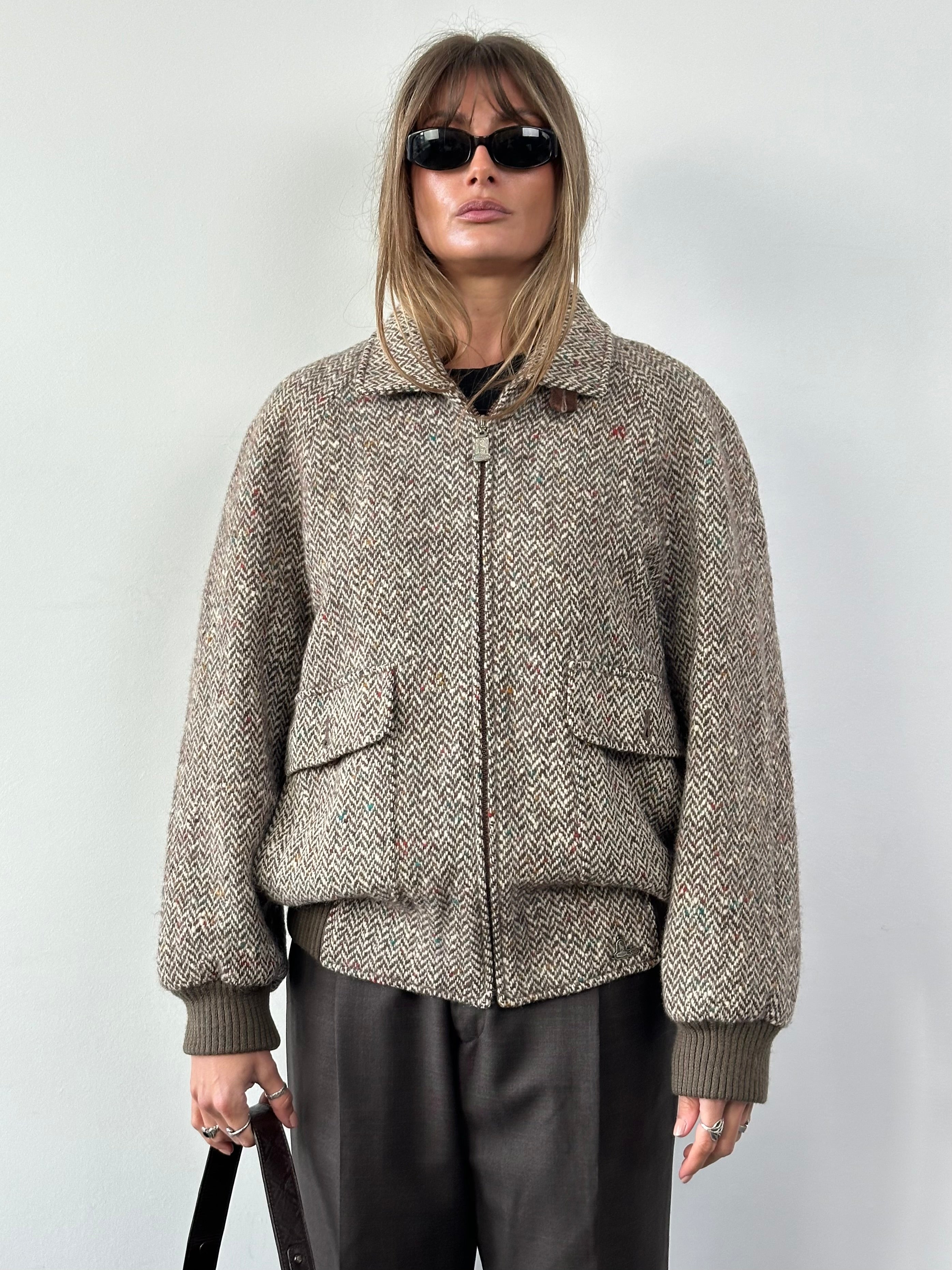 Vintage pure wool herringbone bomber jacket in size L, featuring classic pattern and tailored fit.