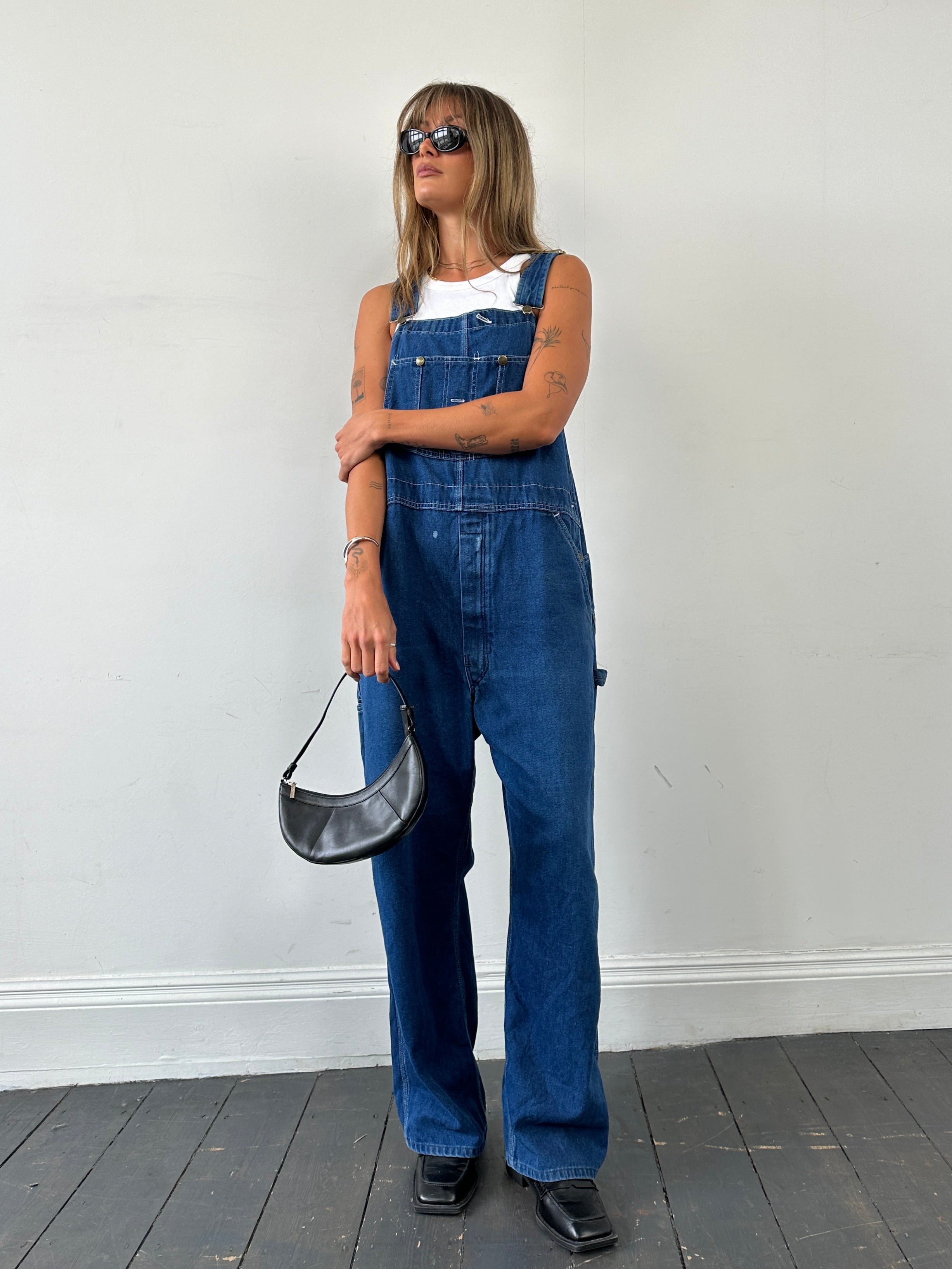 Vintage Roebucks contrast stitch mid wash denim dungarees in XL, showing front view with adjustable straps and side pockets.