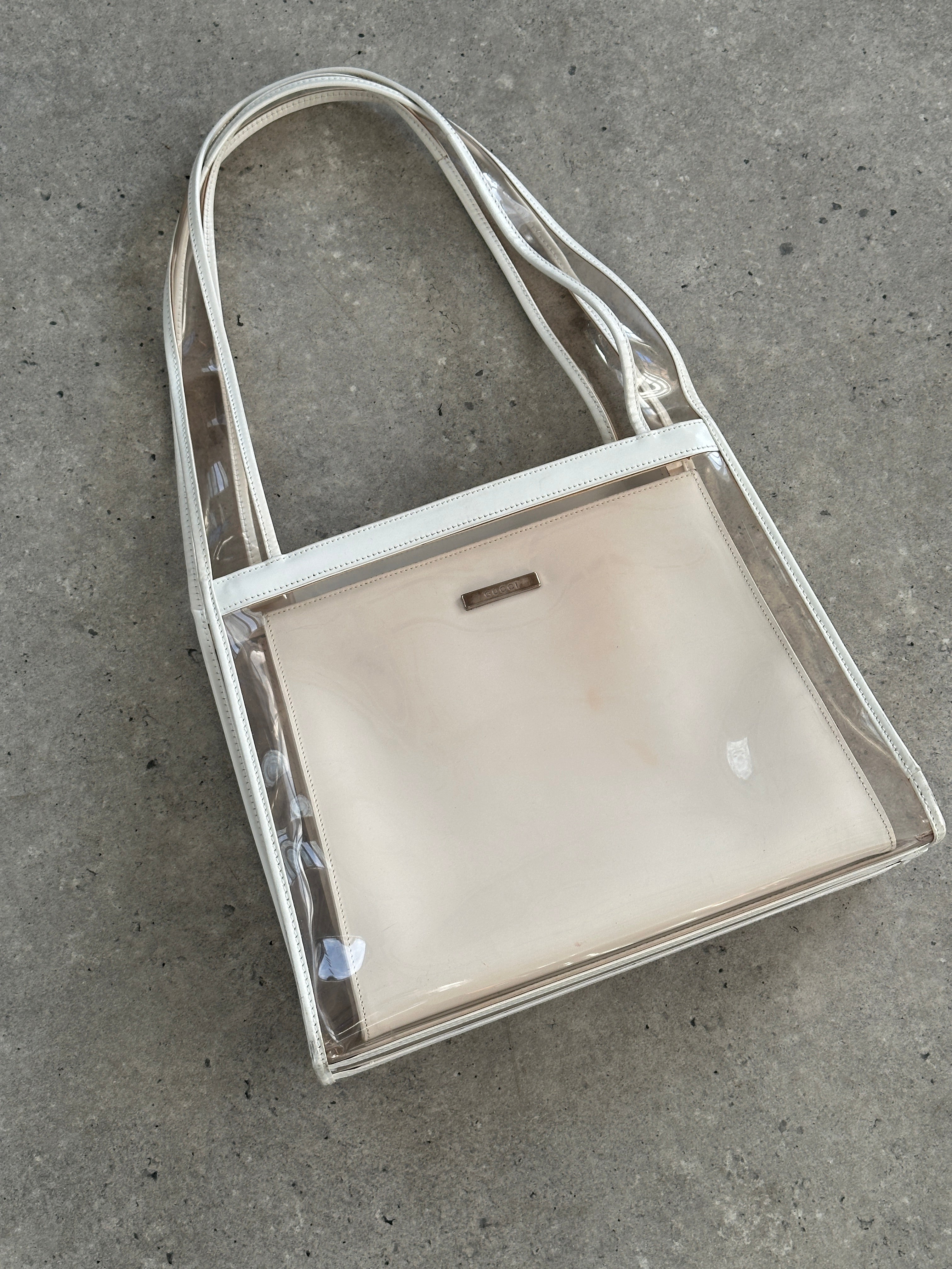 Gucci 1990s Tom Ford 2-in-1 leather and vinyl shoulder bag with adjustable strap and signature design details.