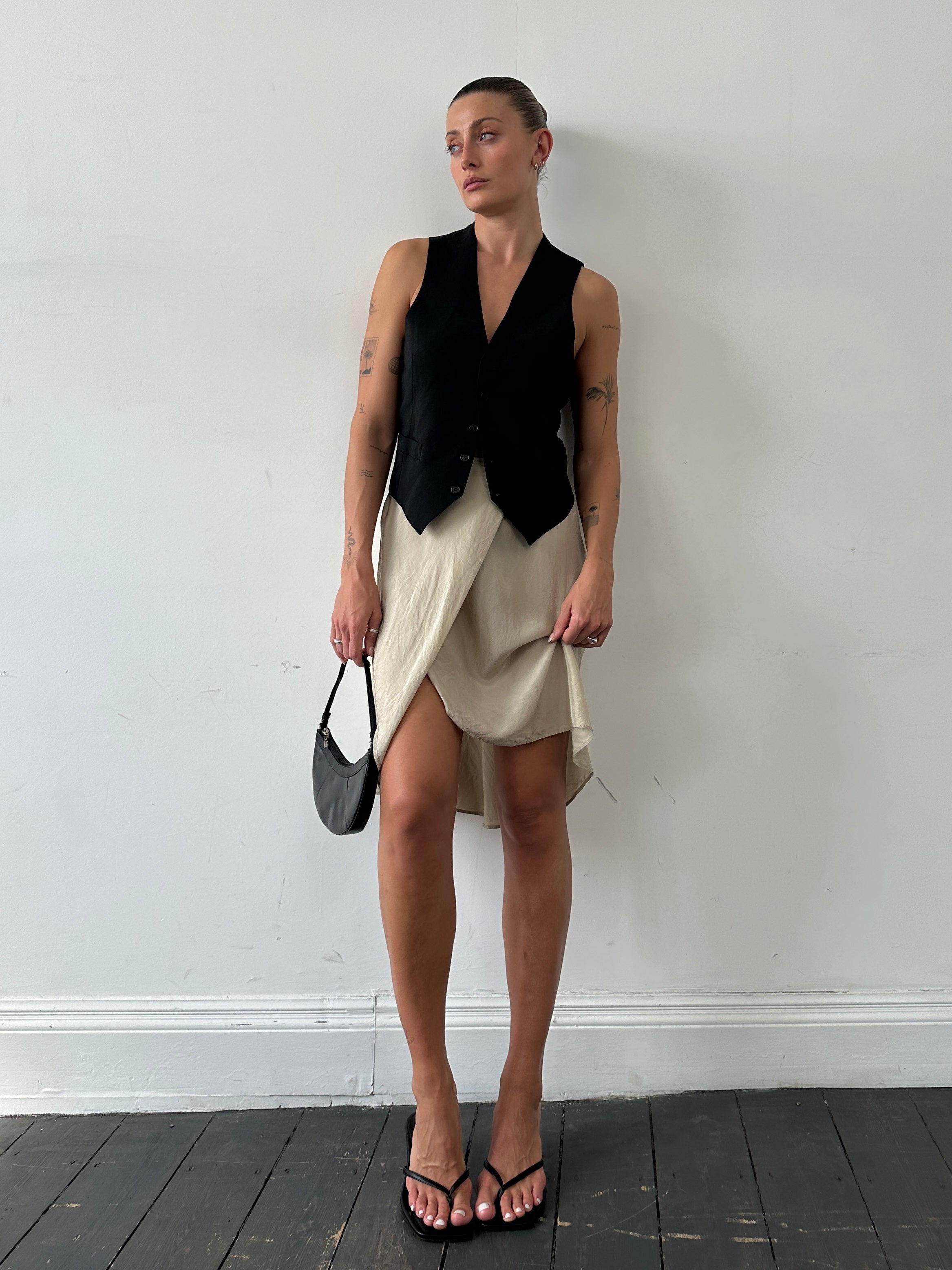 Max Mara pure silk wrap skirt in W27 color, featuring a sleek, flowing design and elegant silhouette.