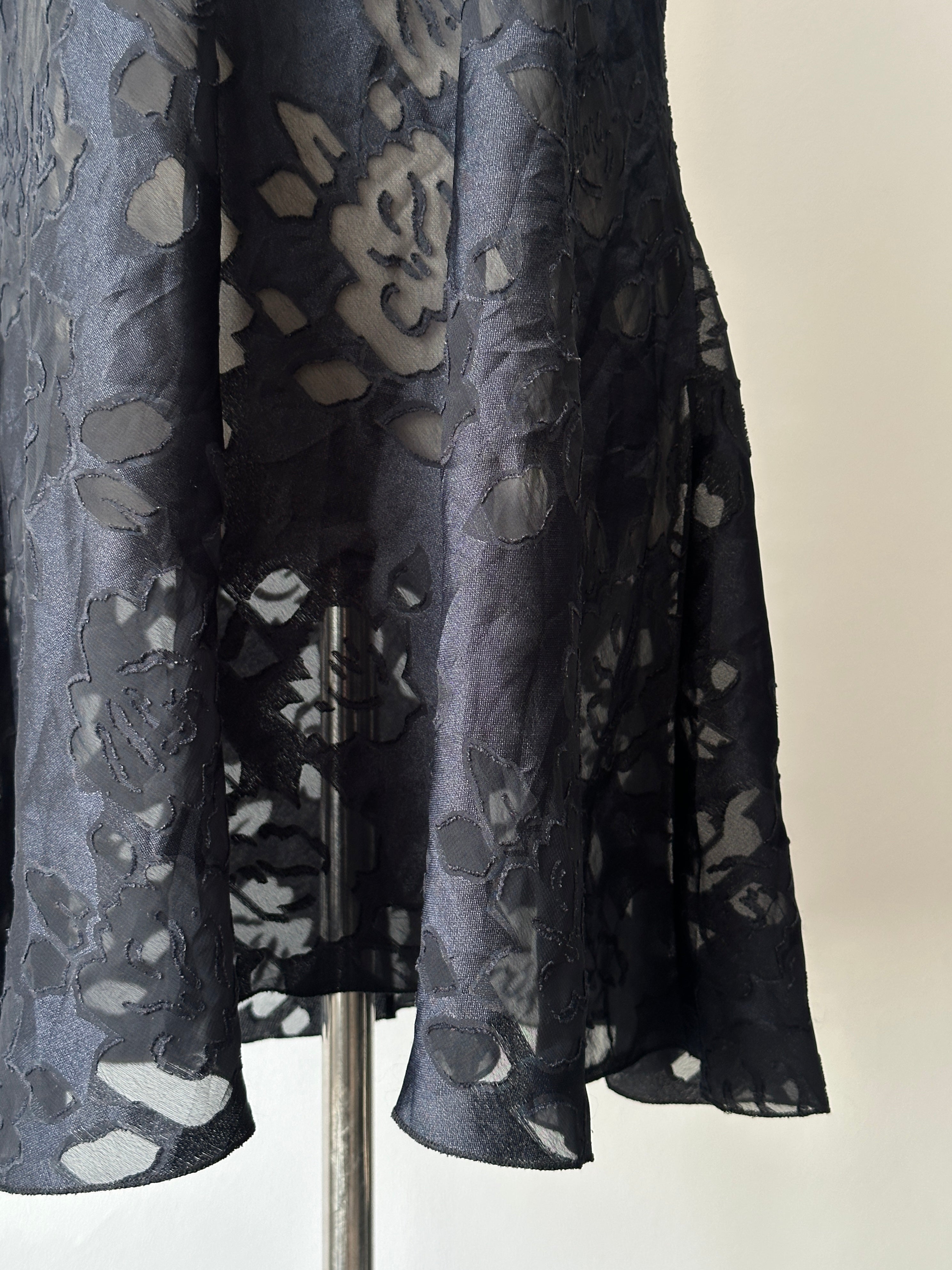 Victoria's Secret 1990s sheer dress in size L, featuring lightweight fabric and vintage-inspired style, displayed on a neutral background.