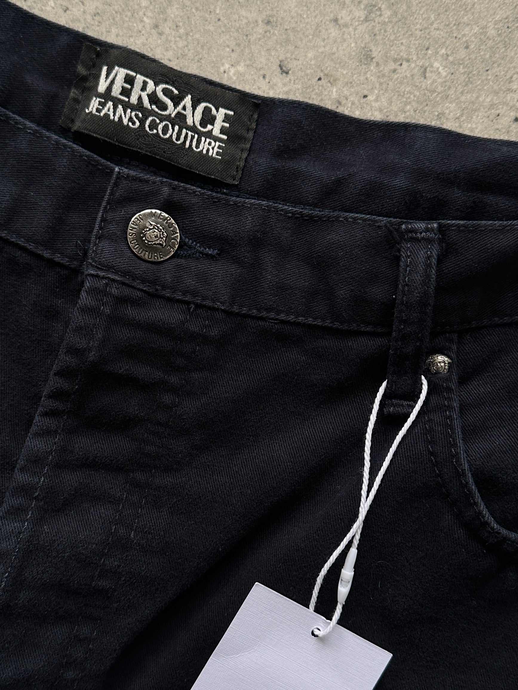 Versace tall pure cotton tapered leg denim jeans in size W34, featuring classic blue wash and tailored fit.