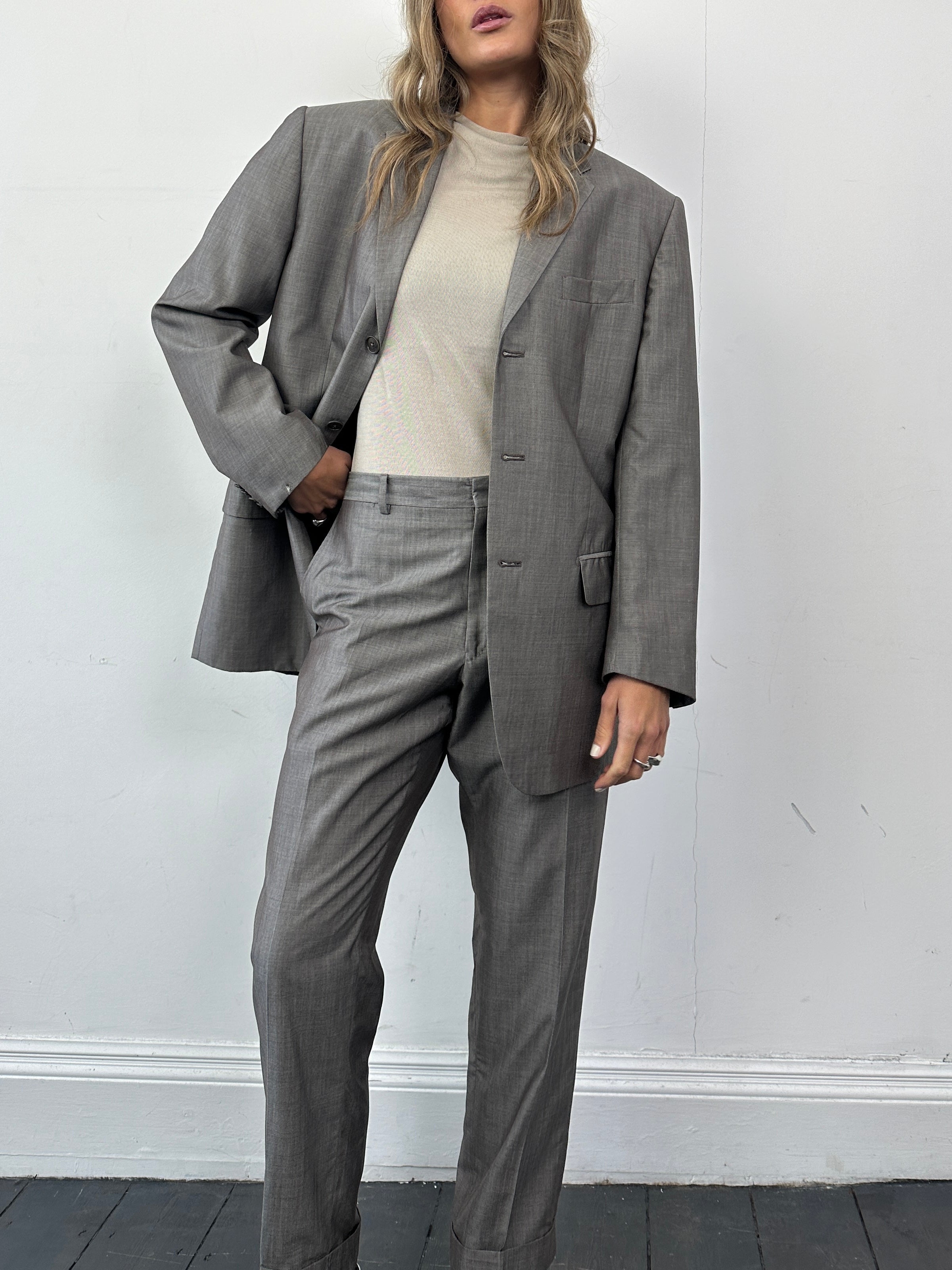 Valentino Virgin Wool Silk Single Breasted Suit Jumpsuit in size 42R/W32, tailored fit with elegant lapel and classic design.