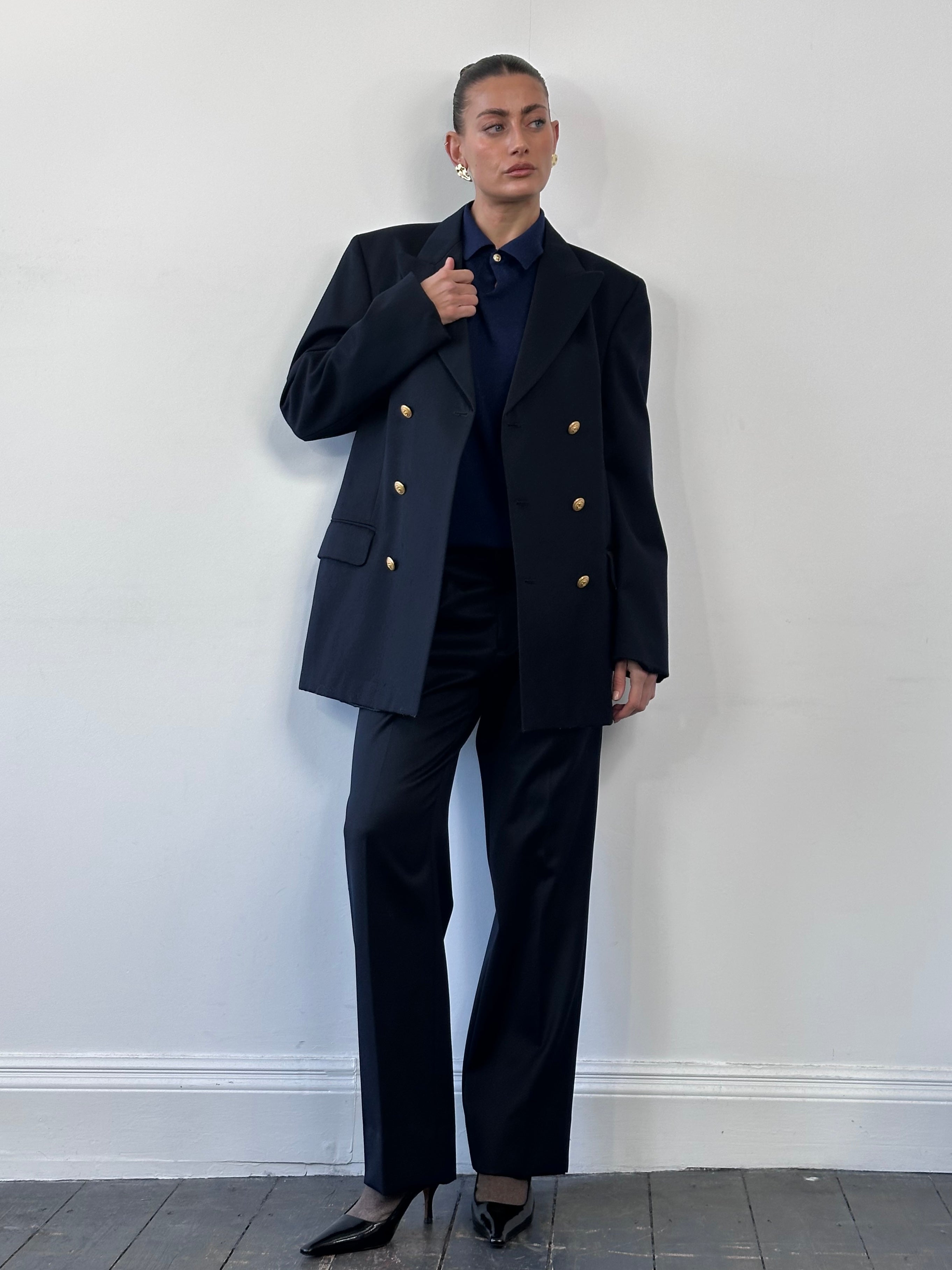 Vintage bespoke button wool double-breasted blazer in size 42L, featuring classic tailored design and rich wool fabric.