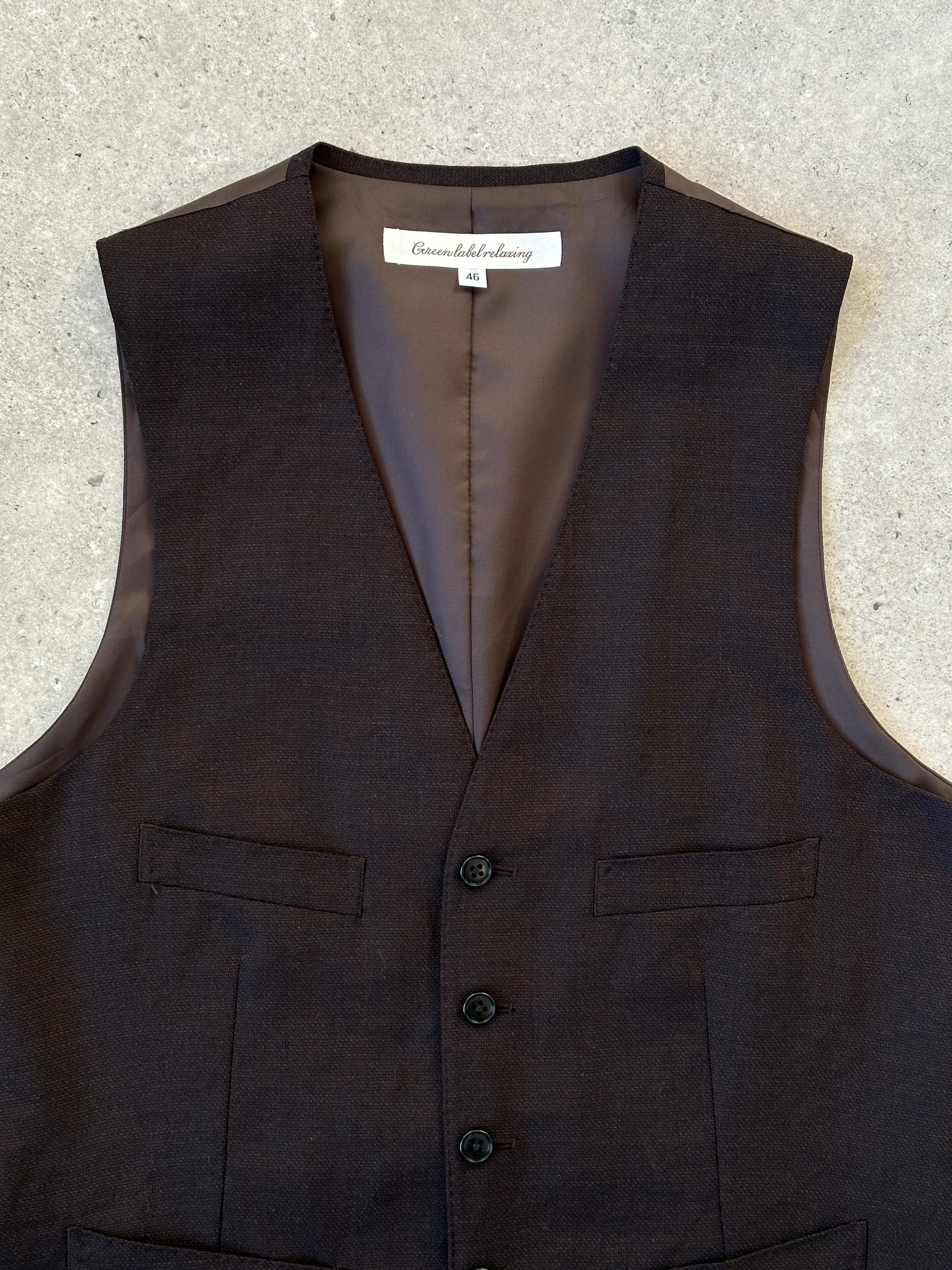 Vintage wool waistcoat coat in size M, featuring classic design and warm fabric, perfect for vintage fashion styles.