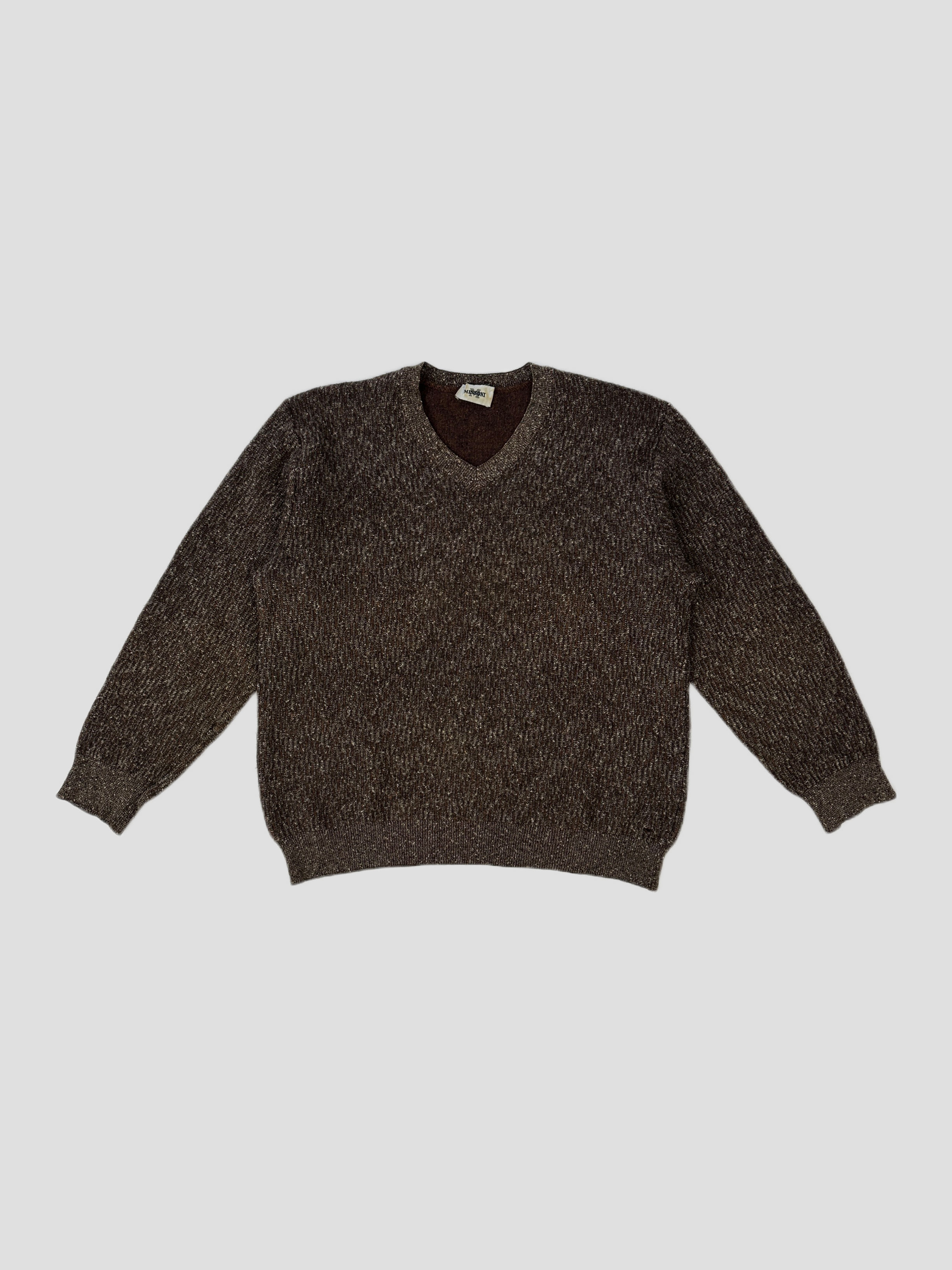 Missoni V neck wool knit jumper in size M, featuring colorful zigzag pattern and cozy texture, perfect for stylish winter wear.