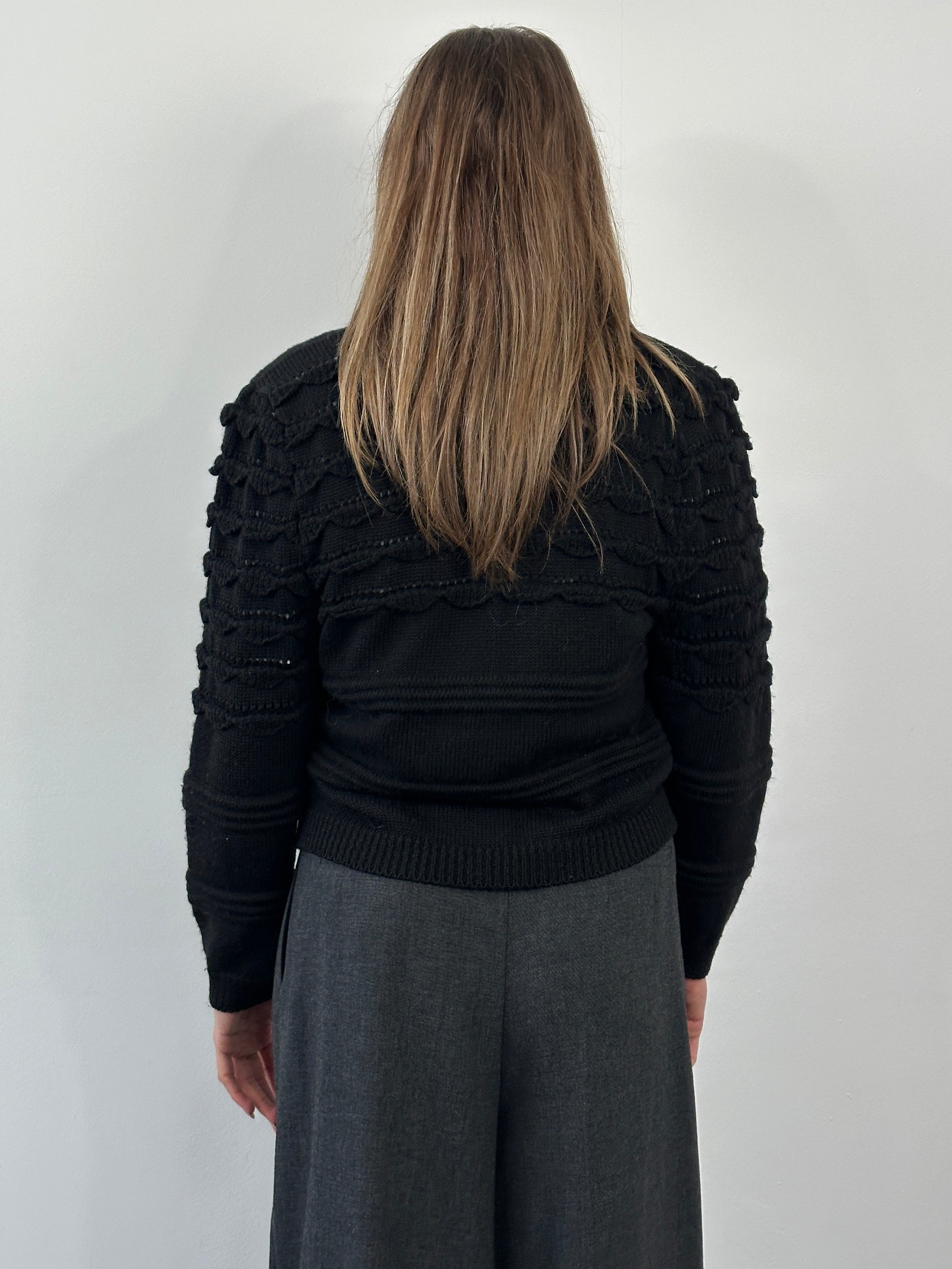 Vintage 1990s pure wool knitted cardigan in size M, featuring a classic design and cozy texture, from the Vintage brand.