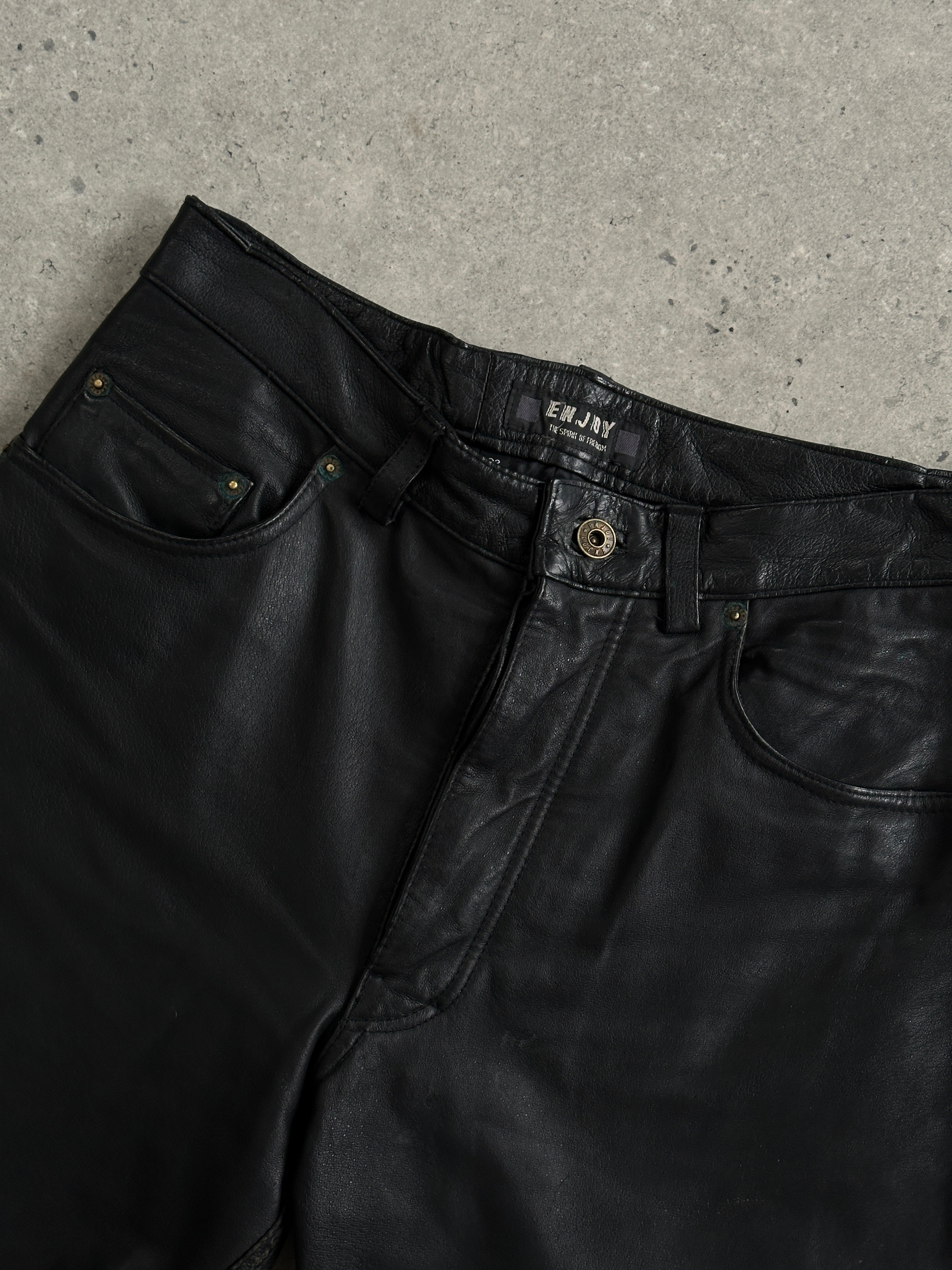 Vintage brand vintage straight leg leather trousers in size W30, featuring a classic design and smooth leather texture.