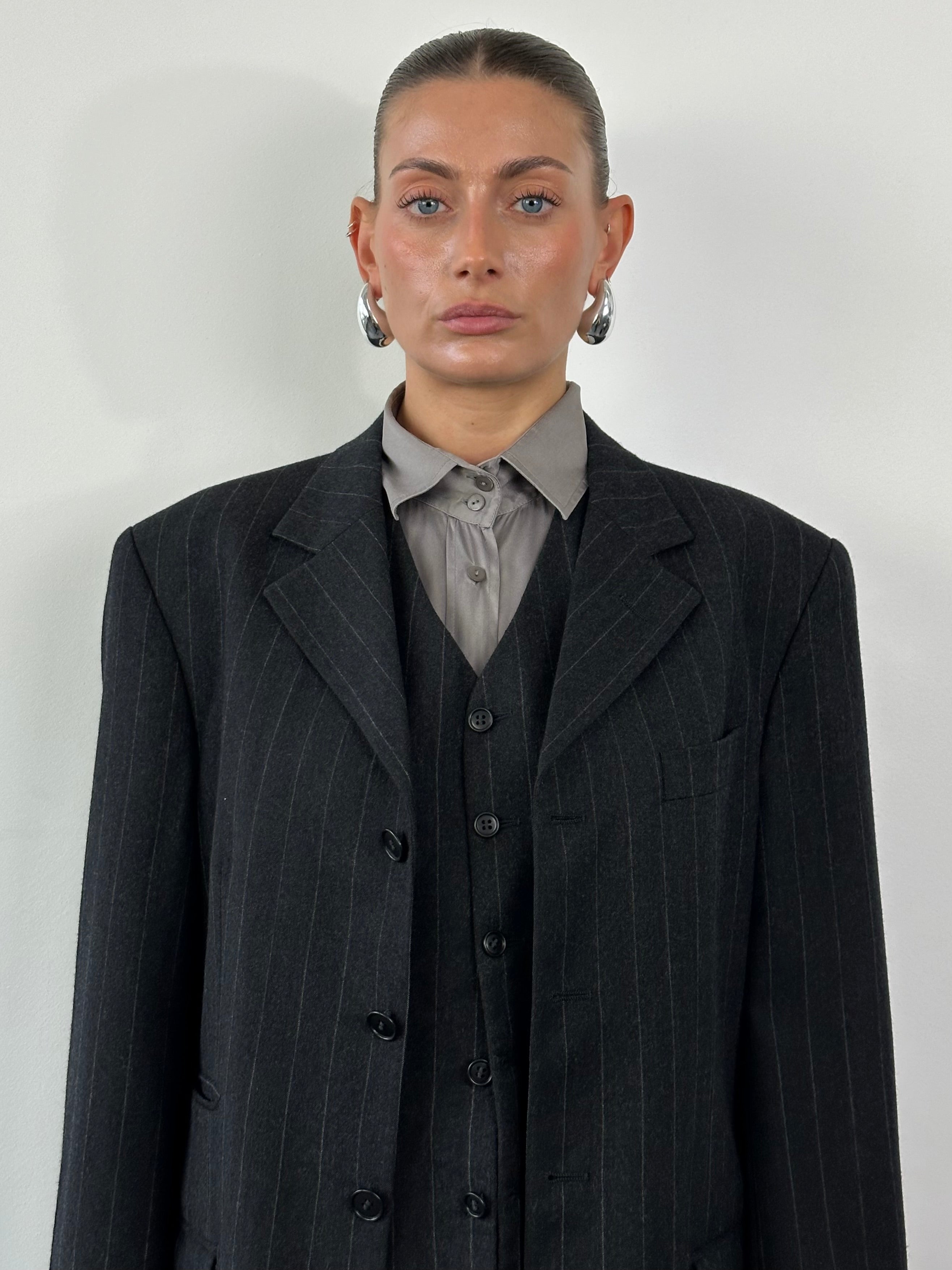 Yves Saint Laurent Pour Homme 1990s brushed wool pinstripe three-piece suit, tailored fit, in 40R/W30 size, classic men's formal wear.