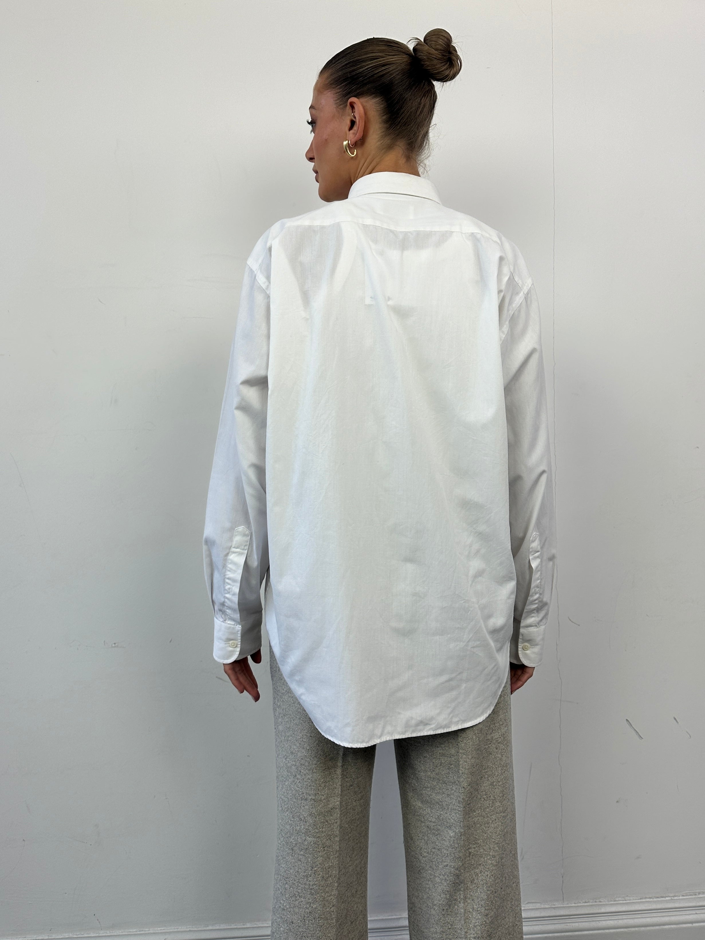 Yves Saint Laurent Pour Homme cotton logo shirt in size M, showcasing a classic design with the brand’s signature logo on the front.