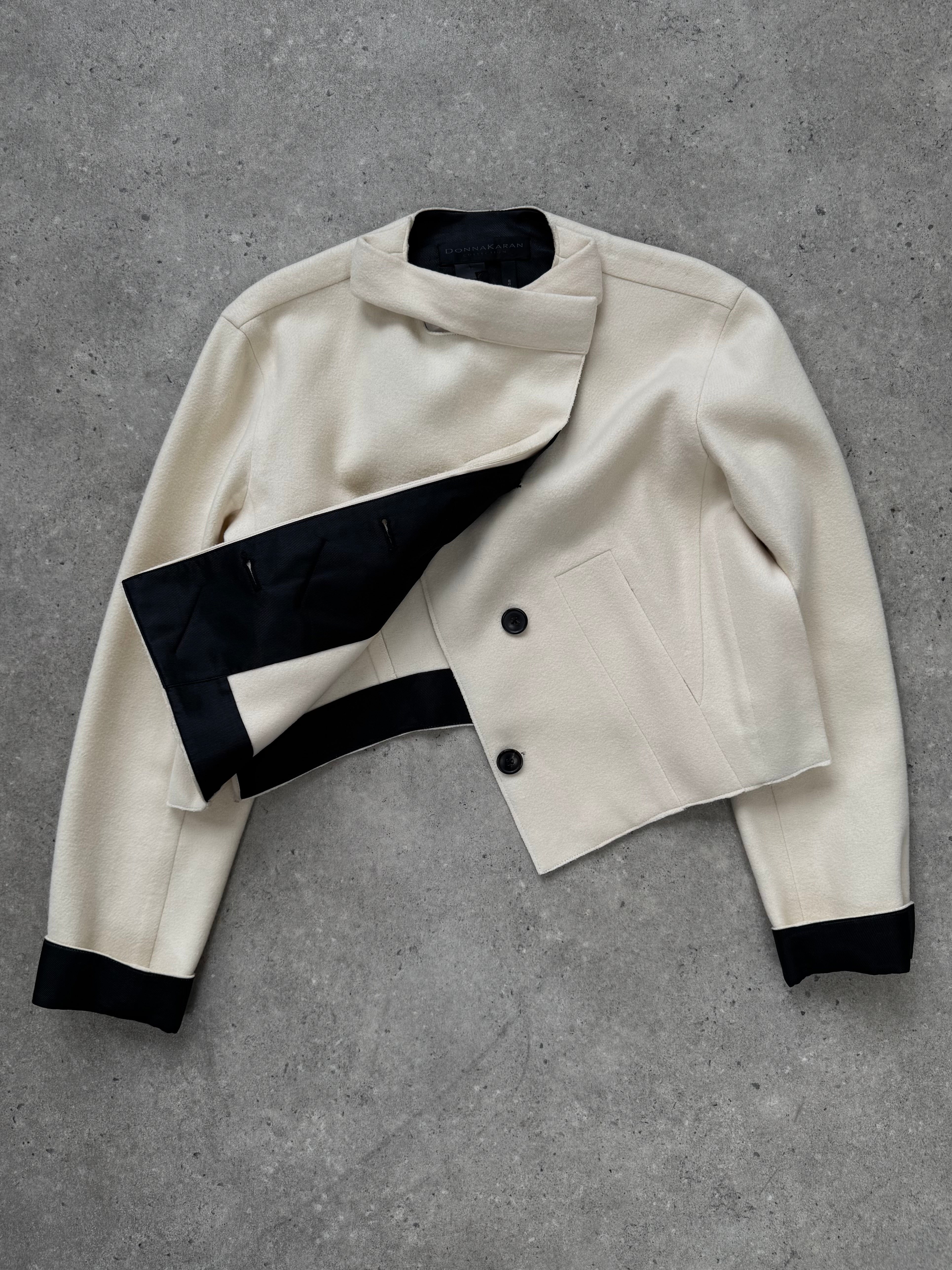 Donna Karan 2000s pure wool cropped jacket, front view showing tailored fit and classic design, in a neutral color.
