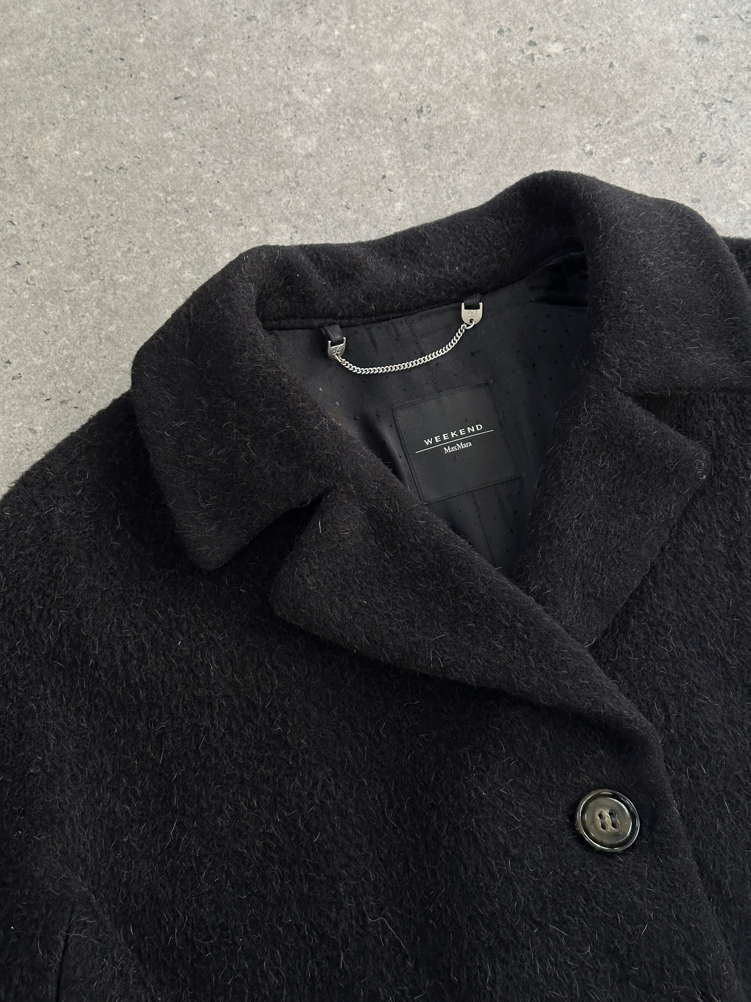 Max Mara Weekend 1990s wool mohair single-breasted coat in size M/L, shown hanging on a wooden hanger.
