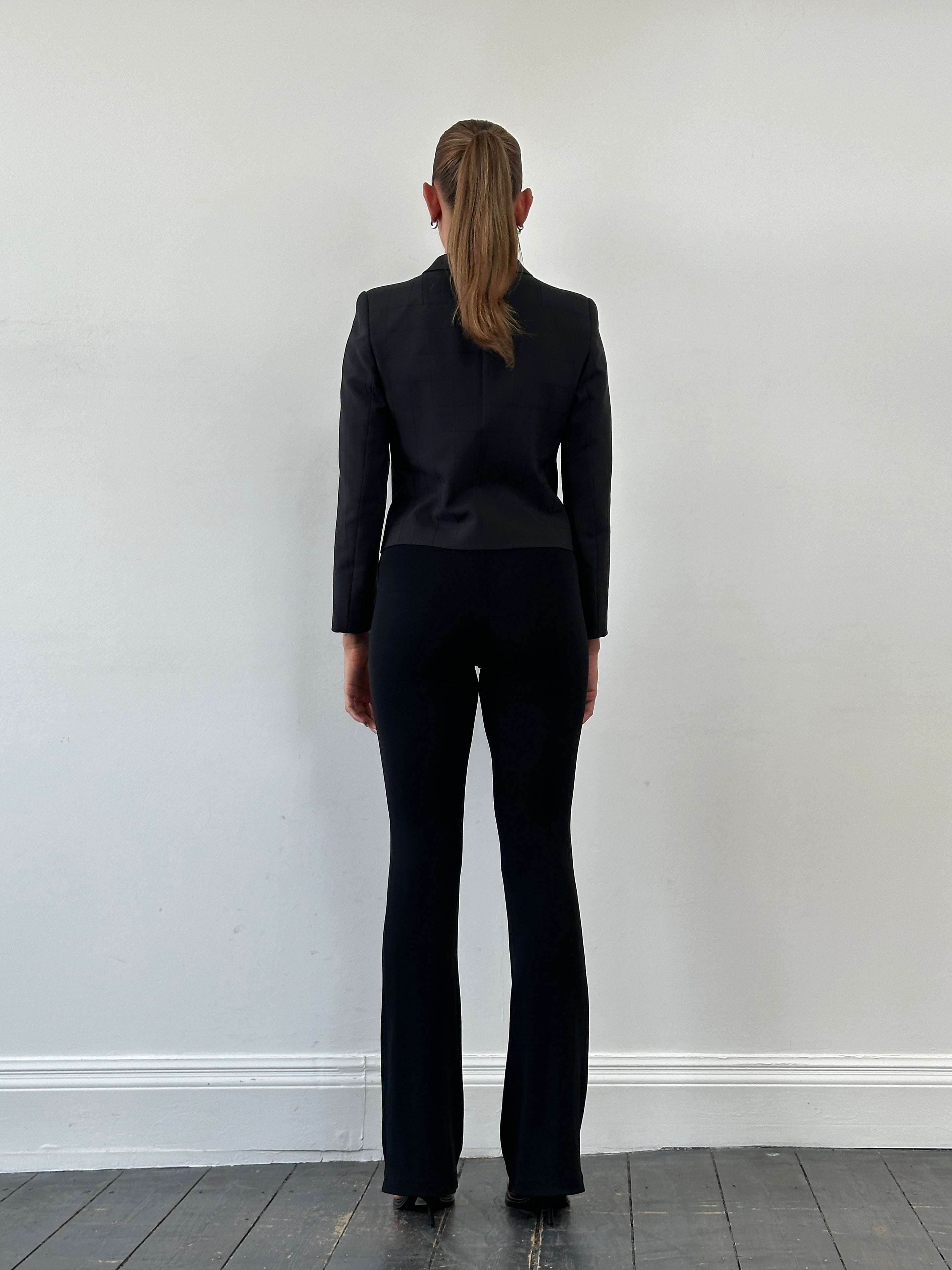 Vintage Italian vintage flared leggings trouser with high waist and retro style, shown on a mannequin.