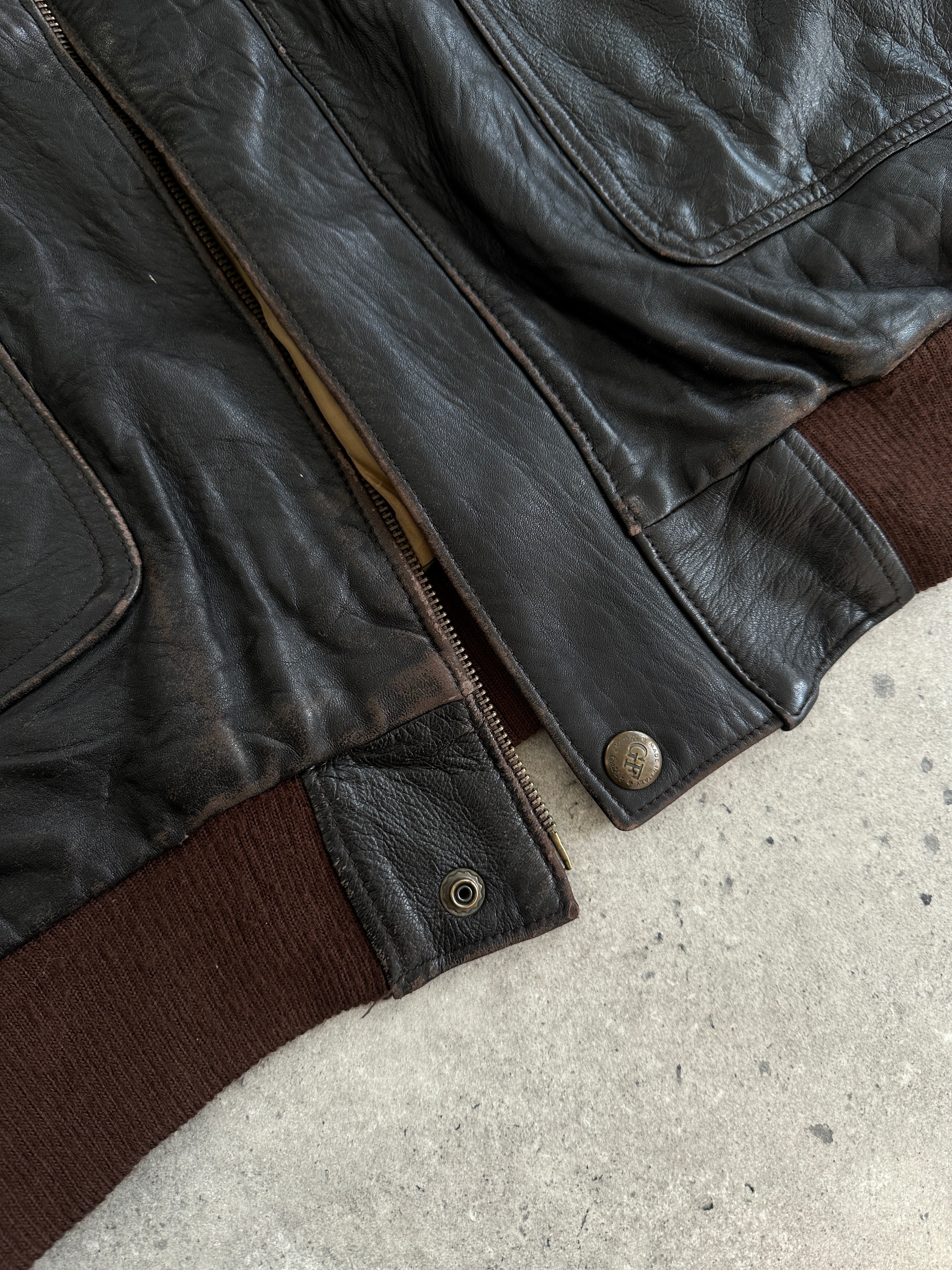 Vintage Italian vintage aged leather bomber jacket in XL, featuring classic design and distressed leather details.