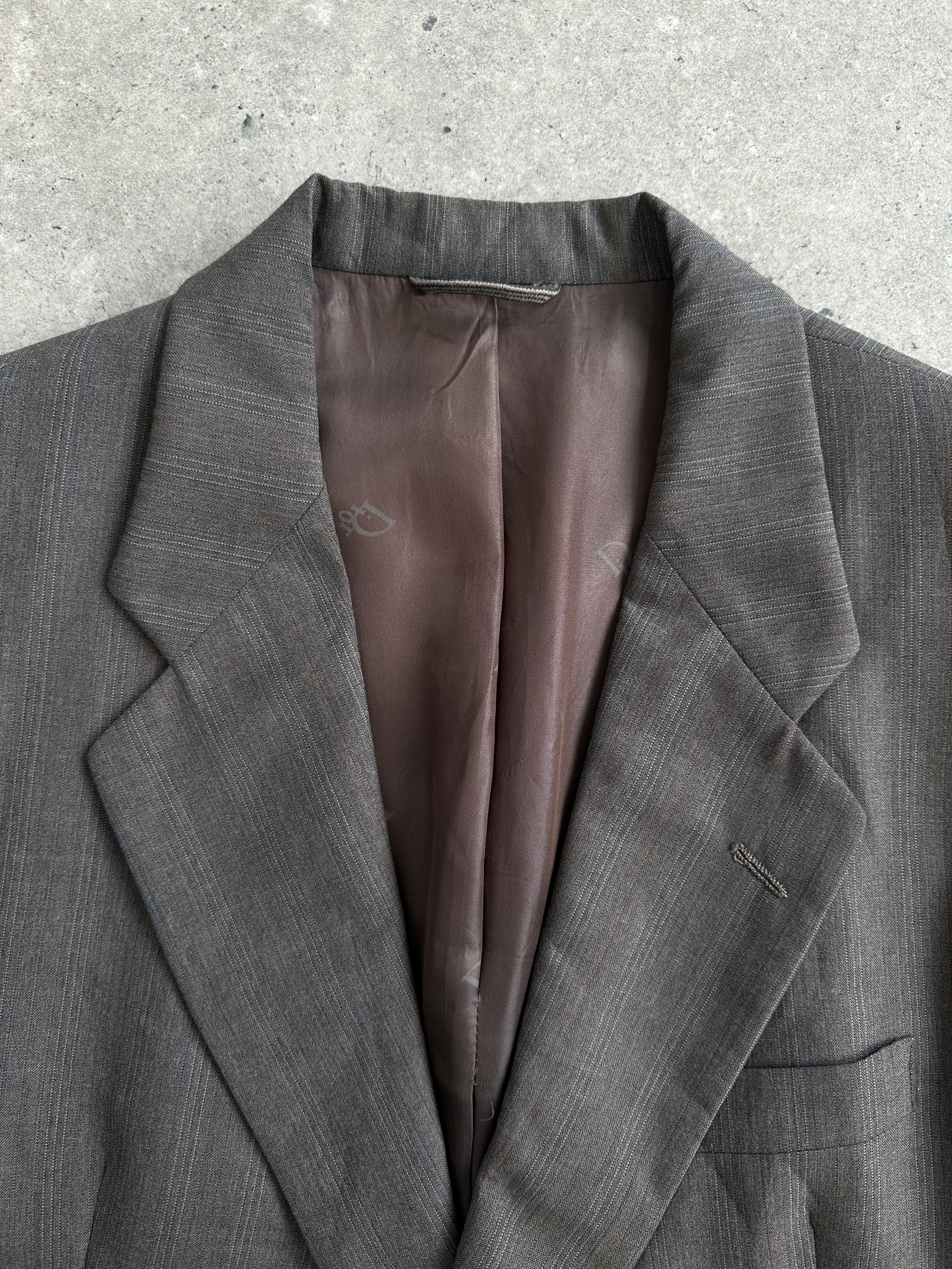 Christian Dior Monsieur 80s stripe single-breasted blazer in size 38R/L, featuring classic tailored design and bold stripe pattern.