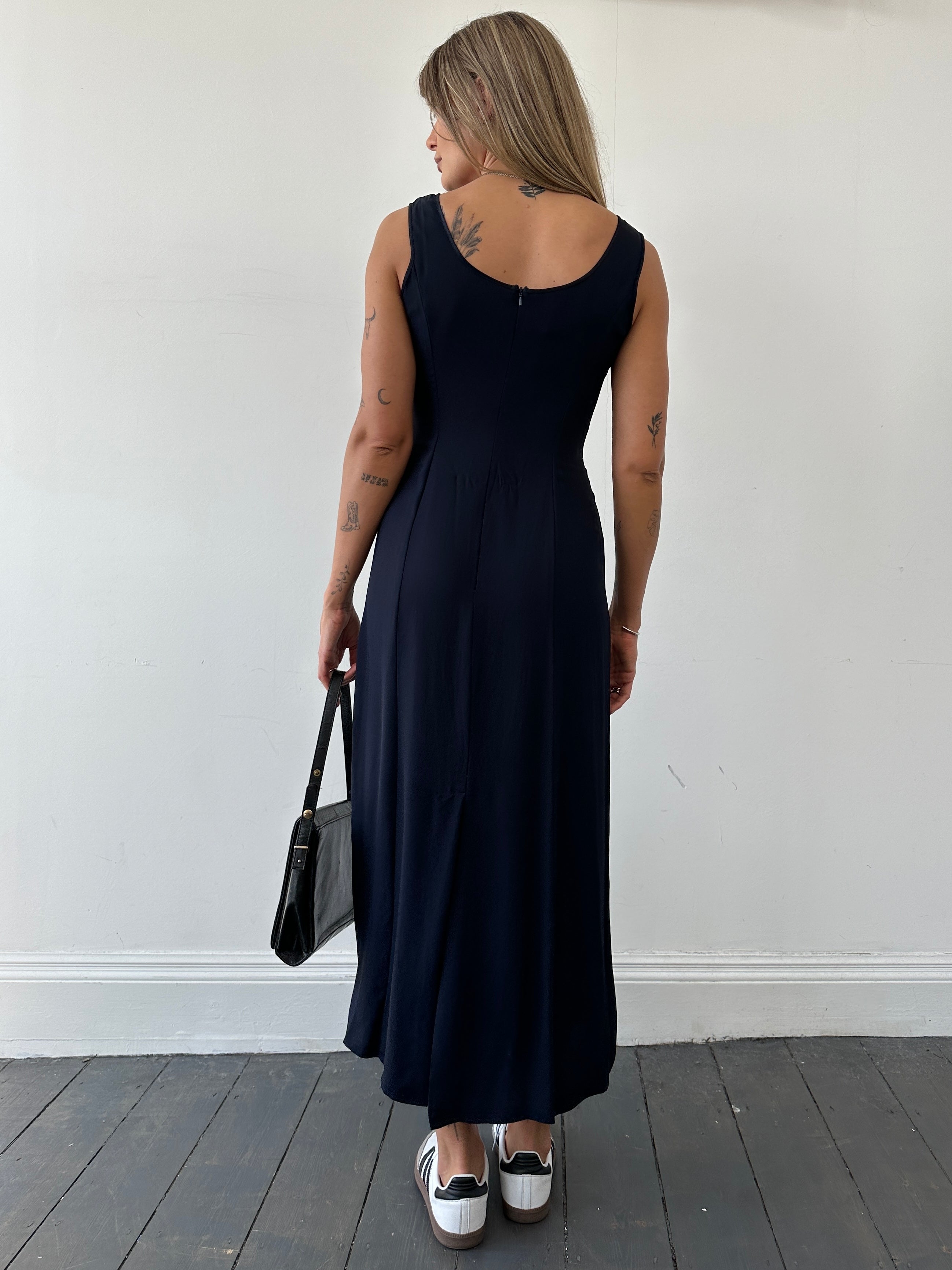 Laura Ashley floor length dress in UK size 10, featuring elegant fabric and a stylish design, perfect for formal occasions.