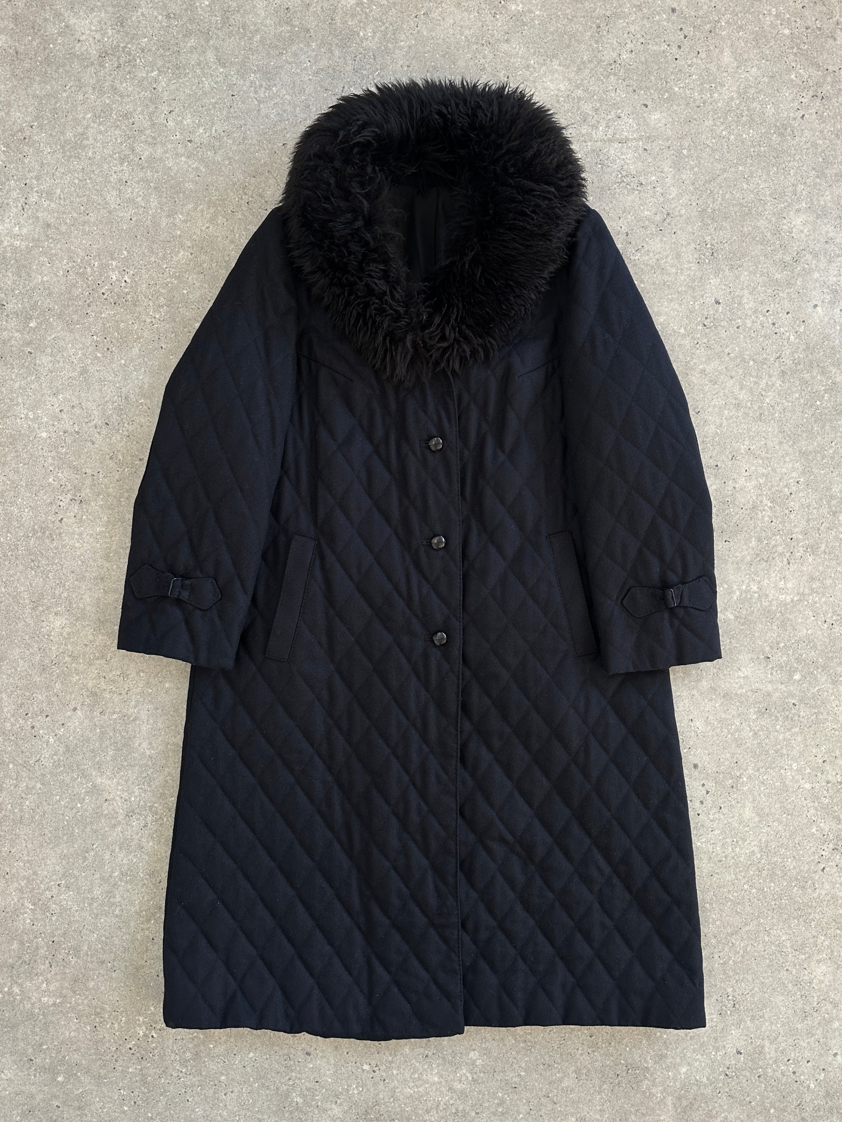 Vintage 1990s wool quilted coat with fur collar, medium size, stylish retro outerwear featuring textured fabric and classic design.
