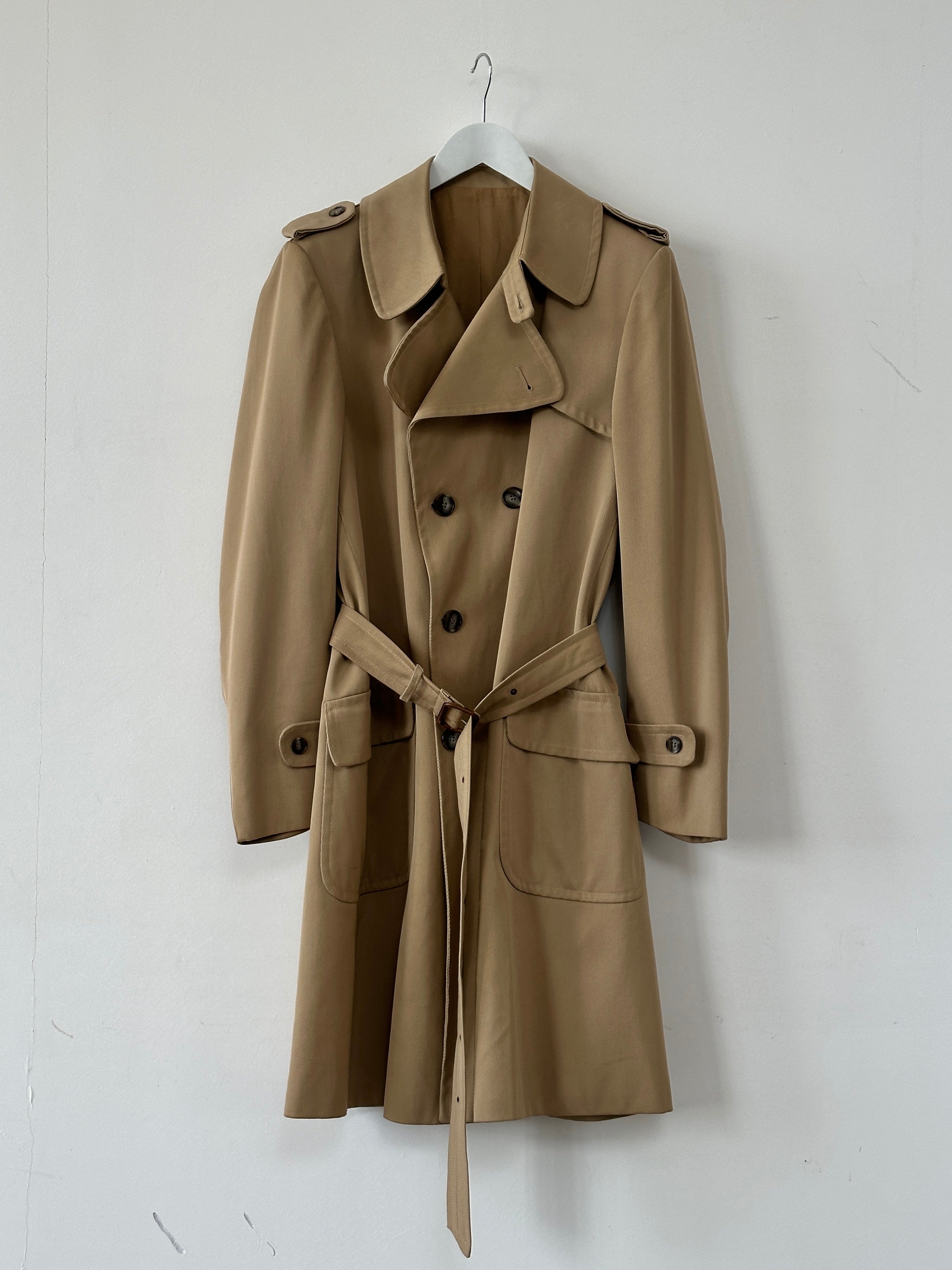 Vintage wool double-breasted trench coat in size large, stylish and warm with classic design and button details.